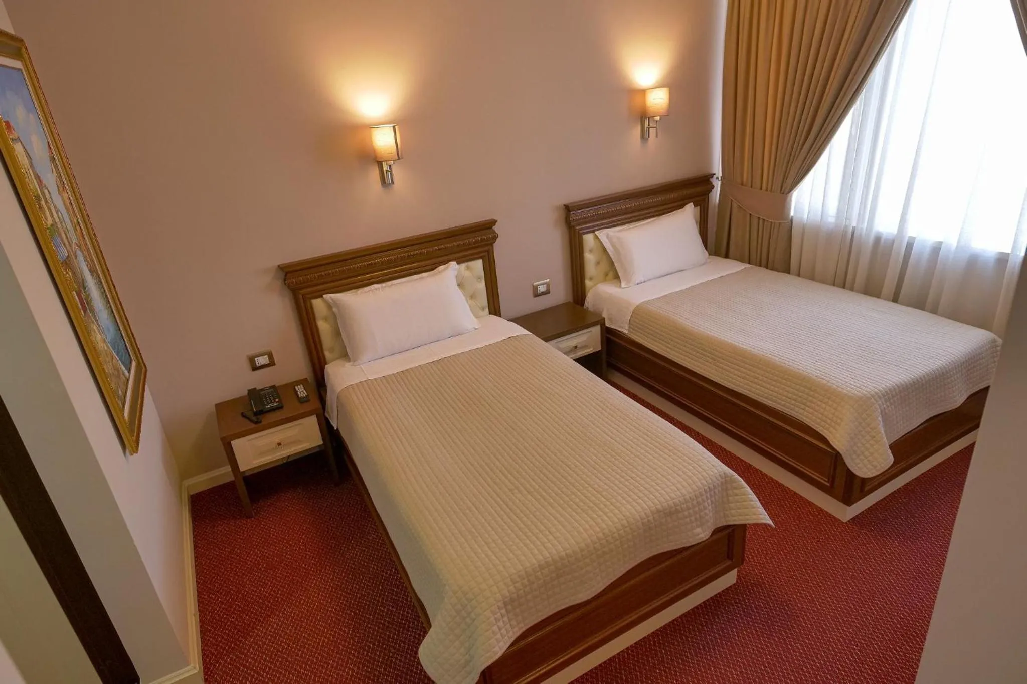 Bed in Rozafa Hotel
