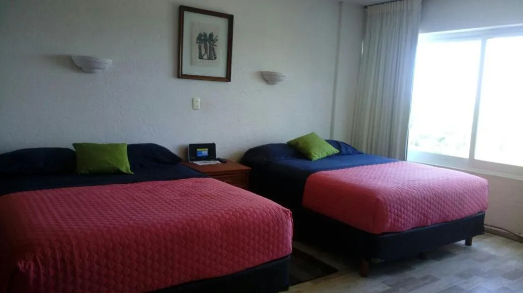 Bed in Suites Brisas Cancun