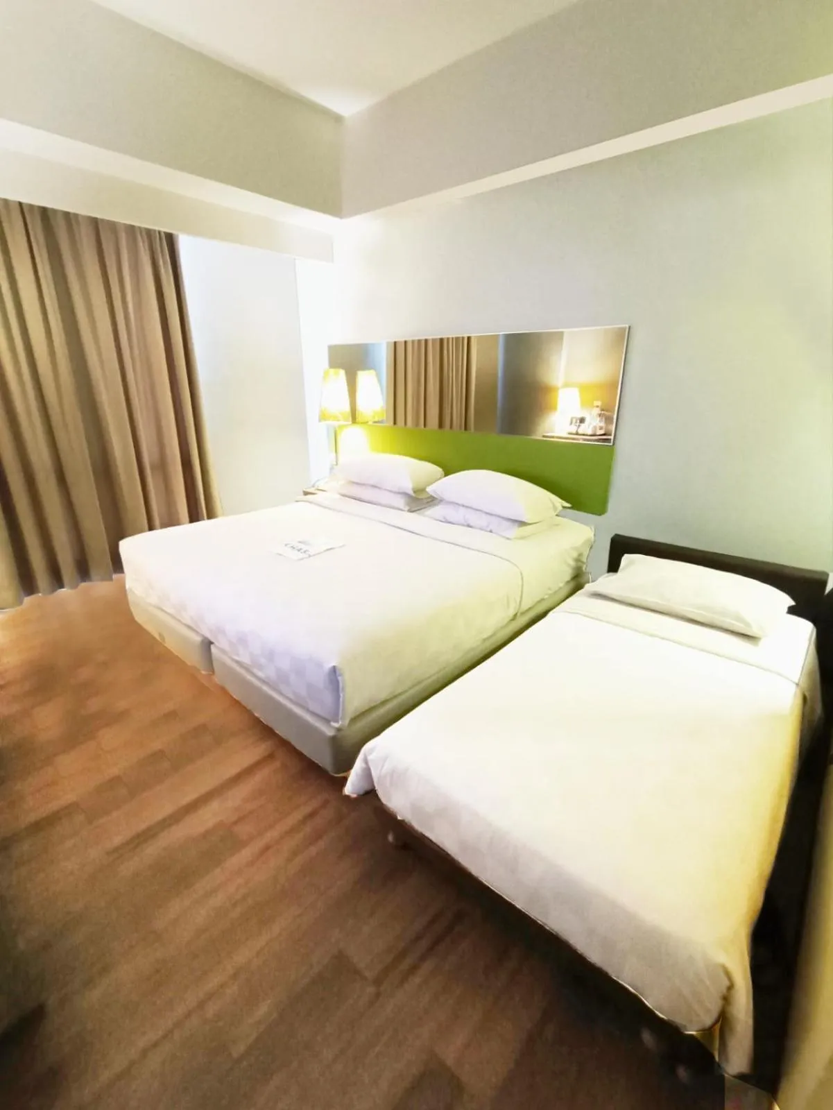 Bed in KHAS Semarang Hotel