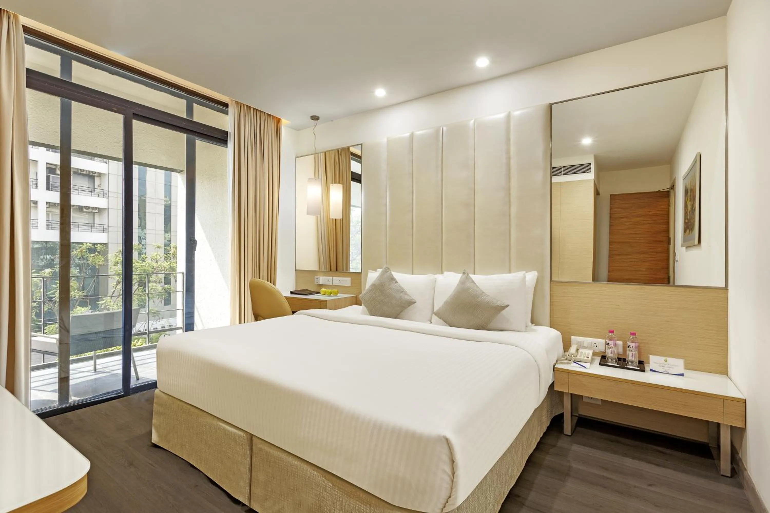 Photo of the whole room, Bed in Sarovar Portico Outer Ring Road