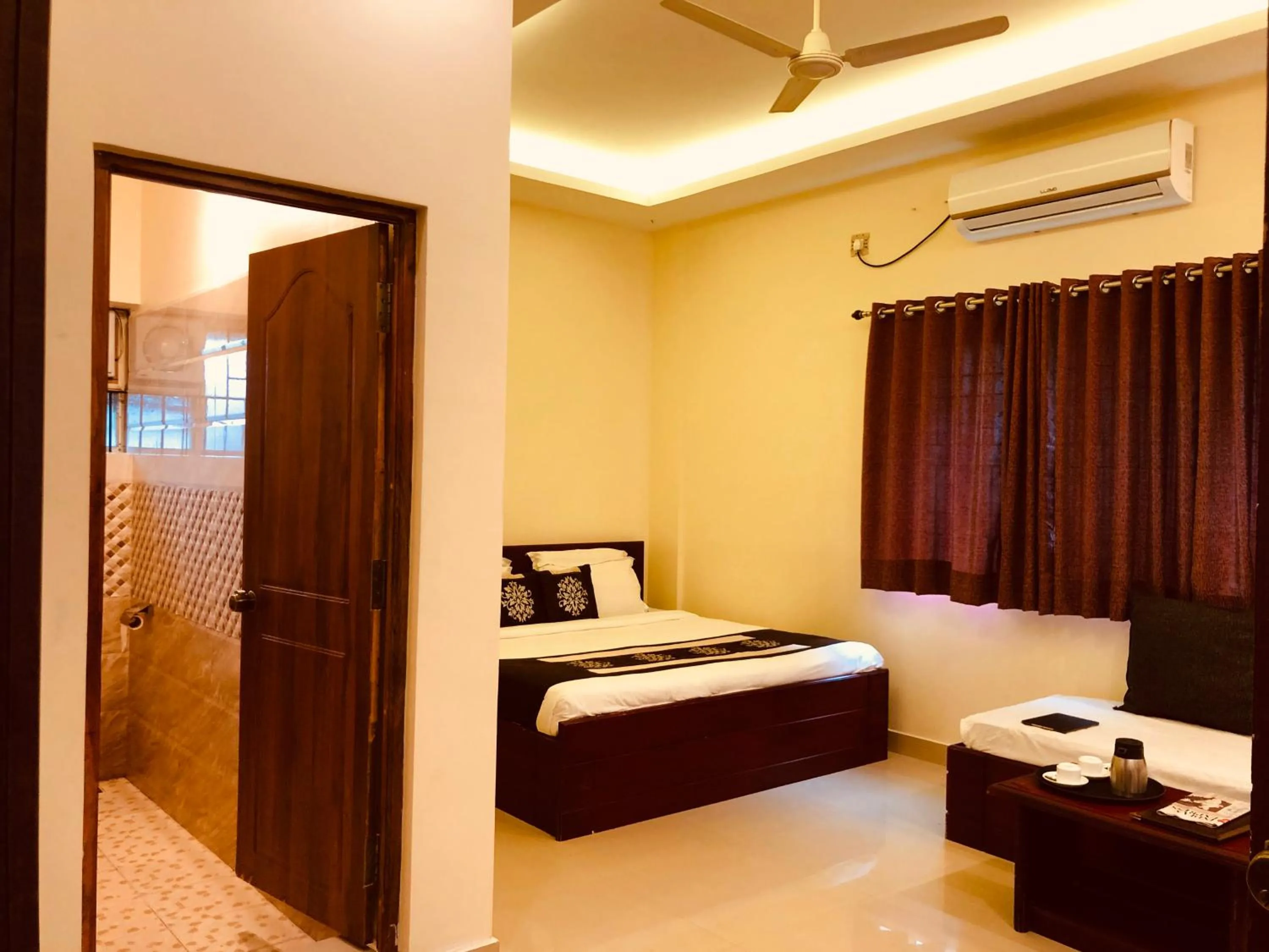 Bed in Palm Era Resorts