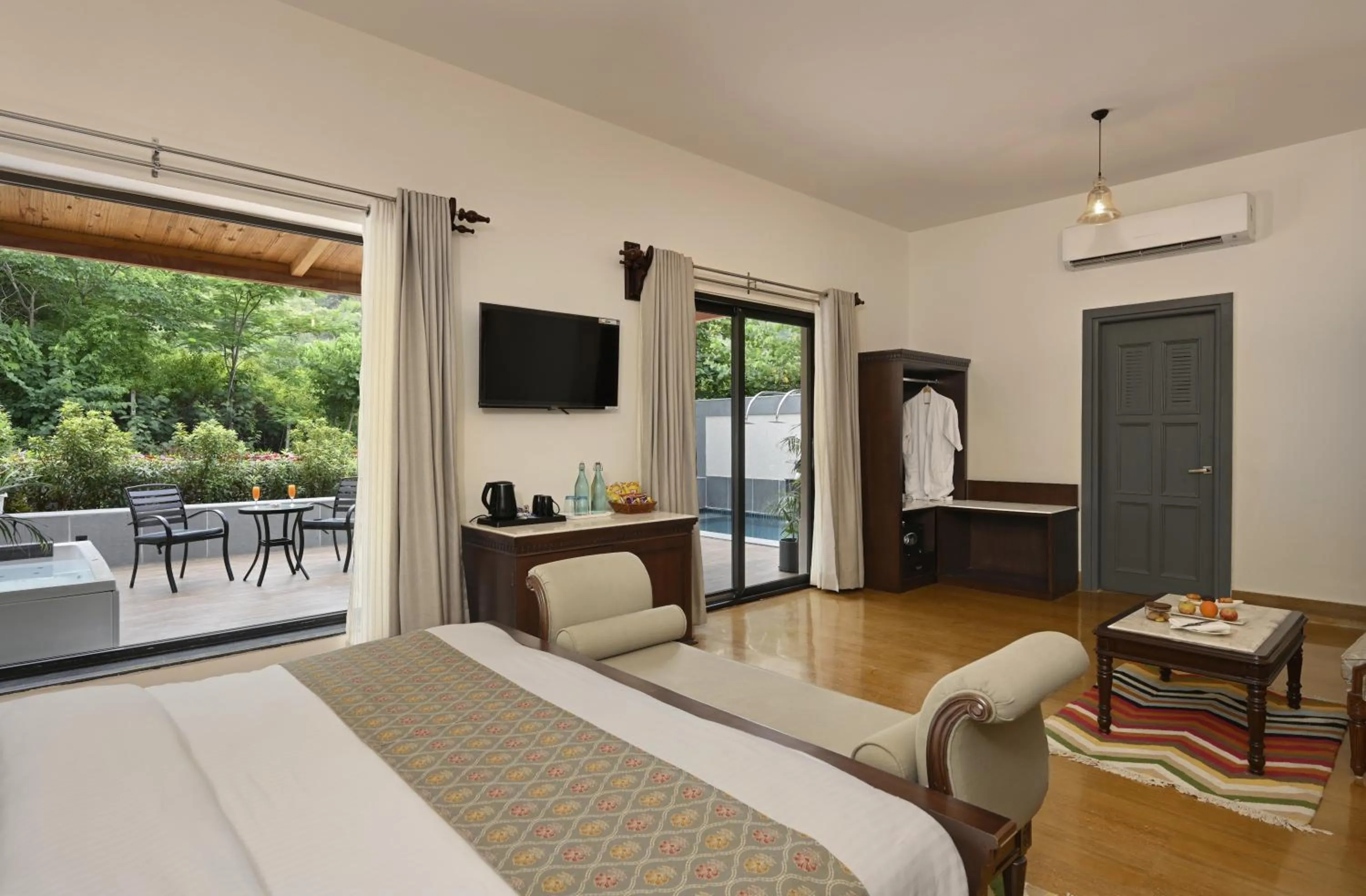 Bedroom, Bed in Anandam - Jacuzzi & Private Pool Villas in Udaipur