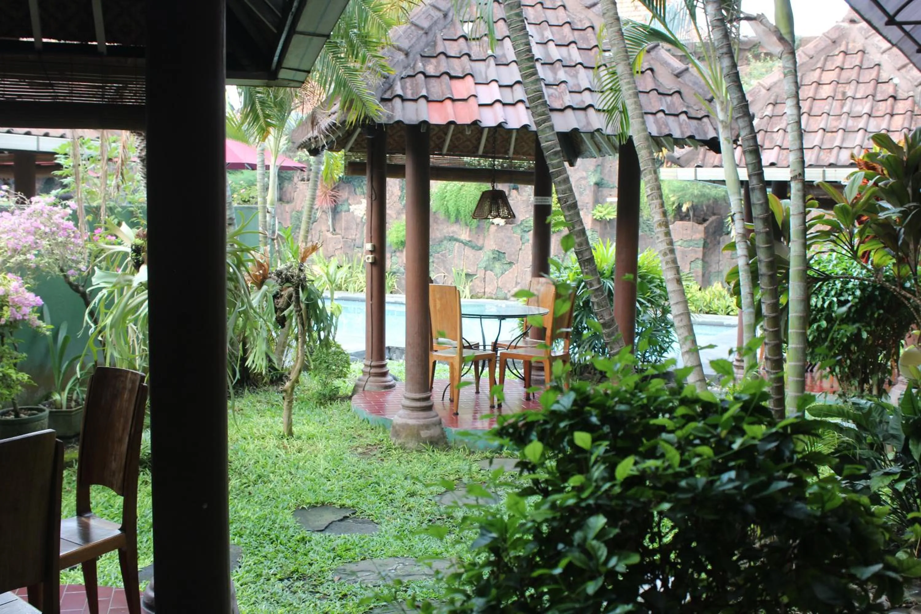 Communal lounge/ TV room in Prambanan Guesthouse