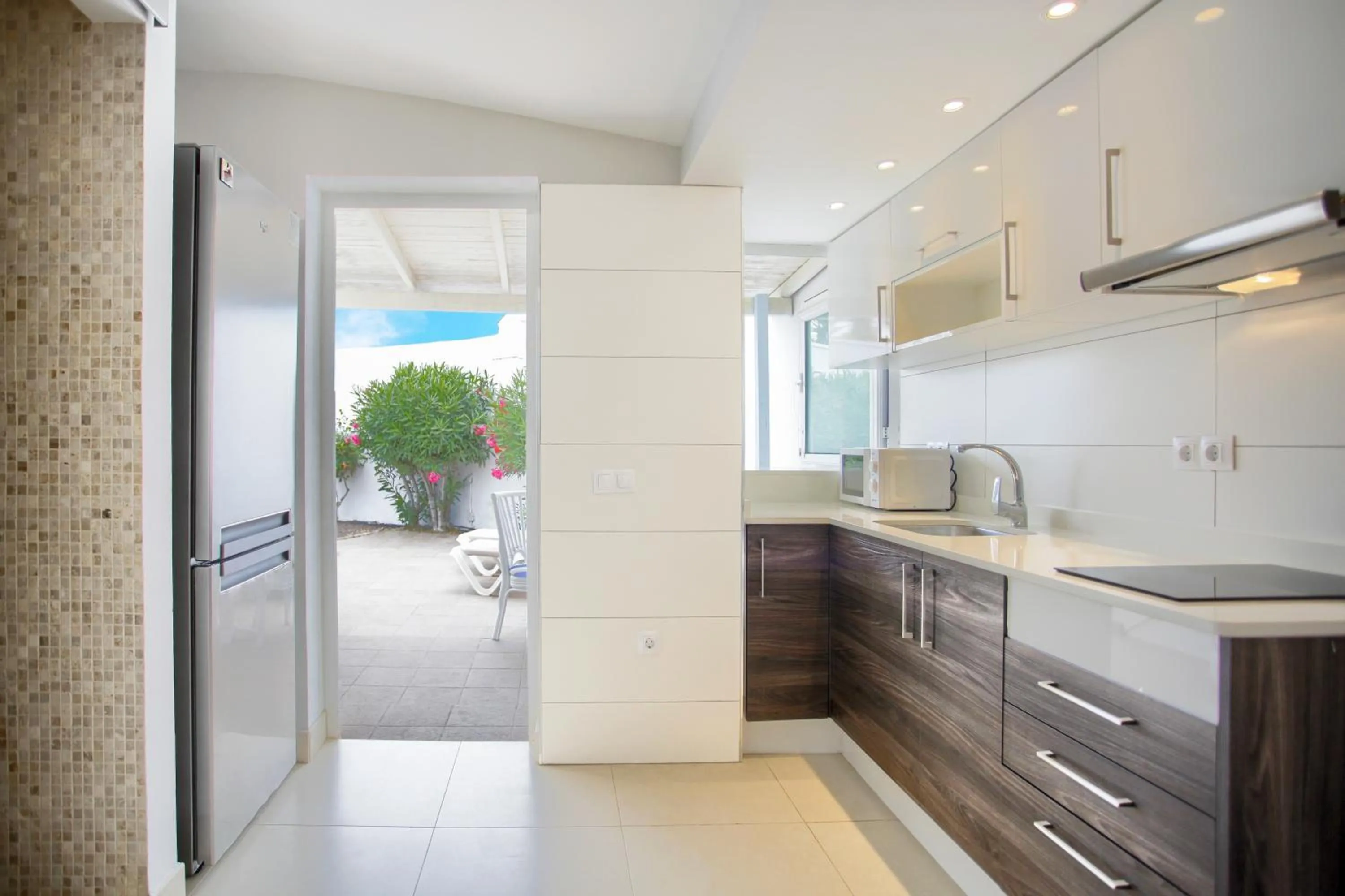 Kitchen or kitchenette in Neptuno Bungalows - Adults Only