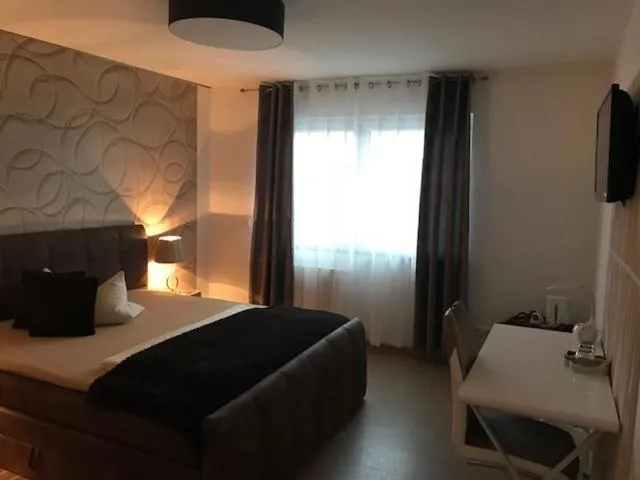 Photo of the whole room, Bed in Aparthotel Magnolia