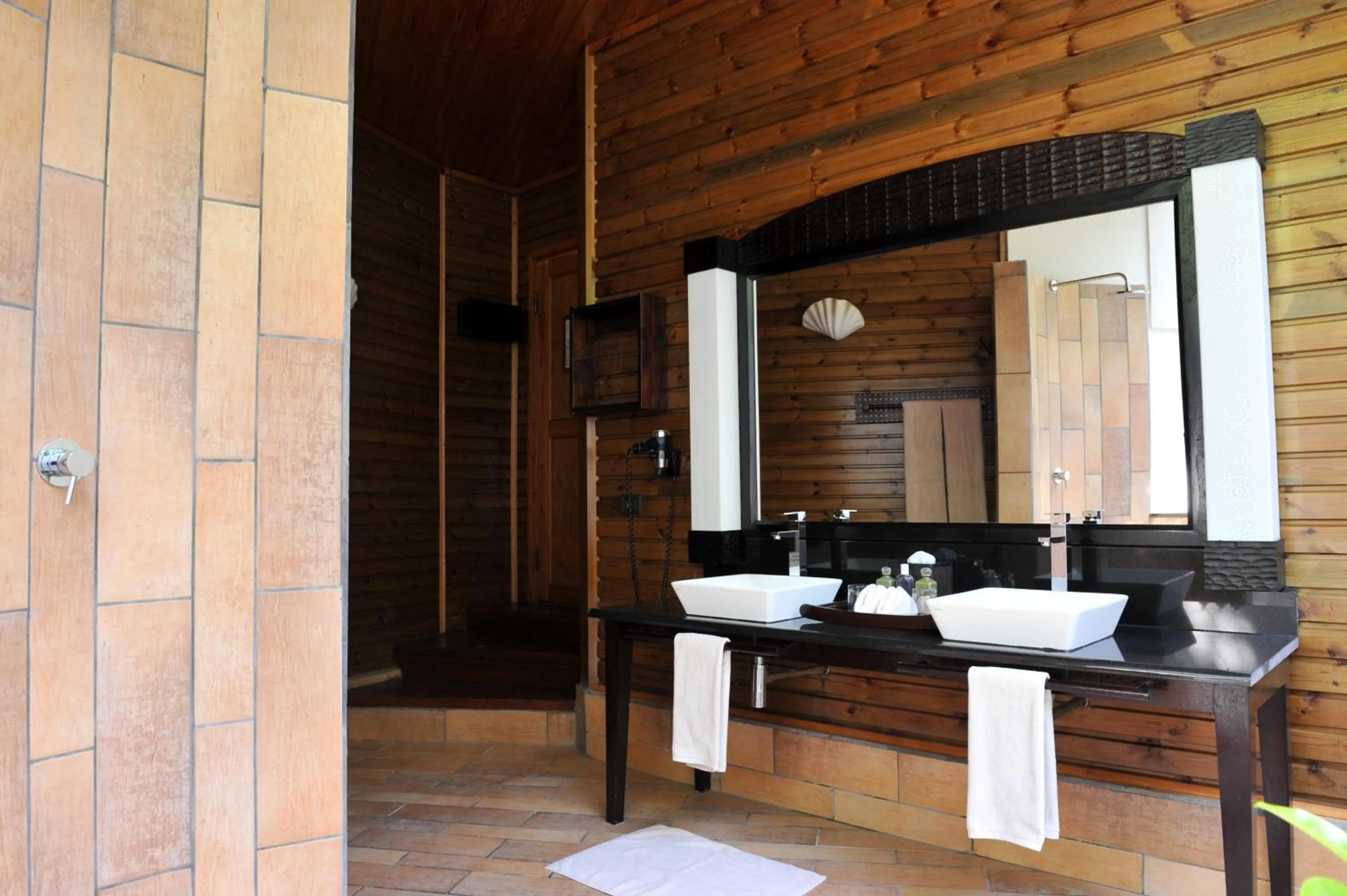 Bathroom in Komandoo Island Resort & Spa