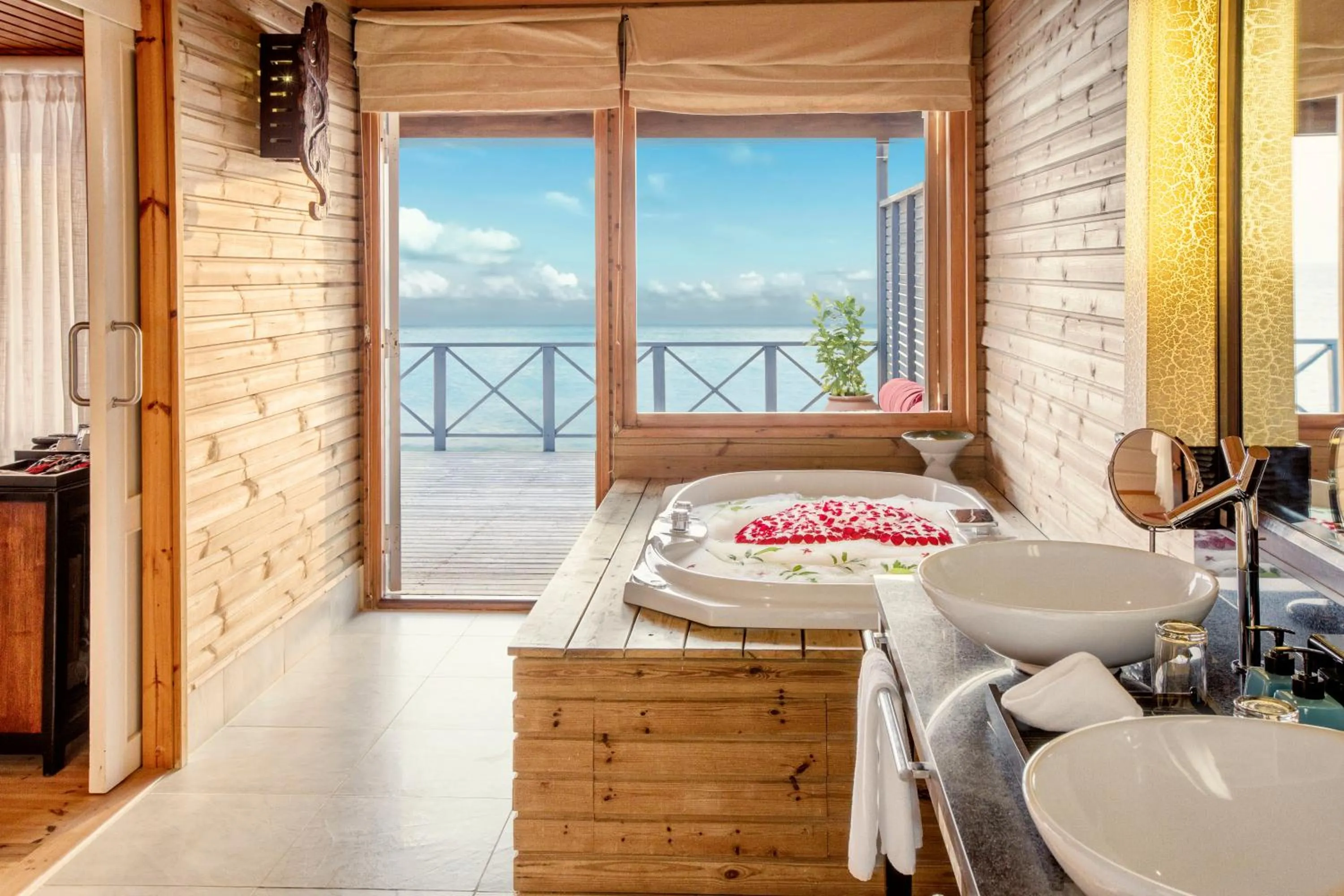 Bathroom, Bed in Komandoo Island Resort & Spa