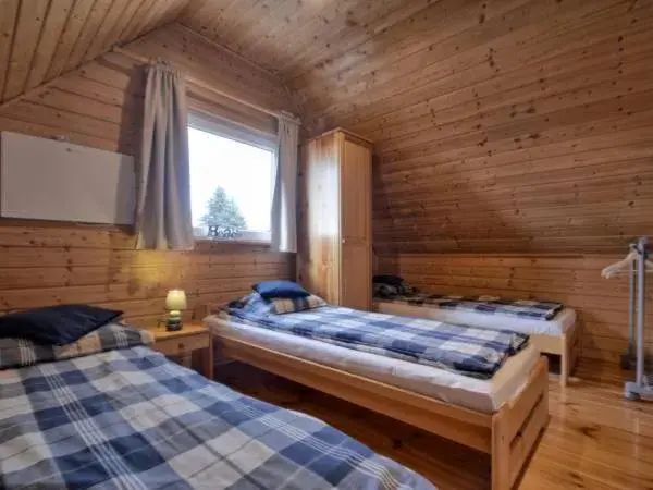 Two-Bedroom Chalet in Domki Kaper Rewa Two-Bedroom Chalet in Domki Kaper Rewa