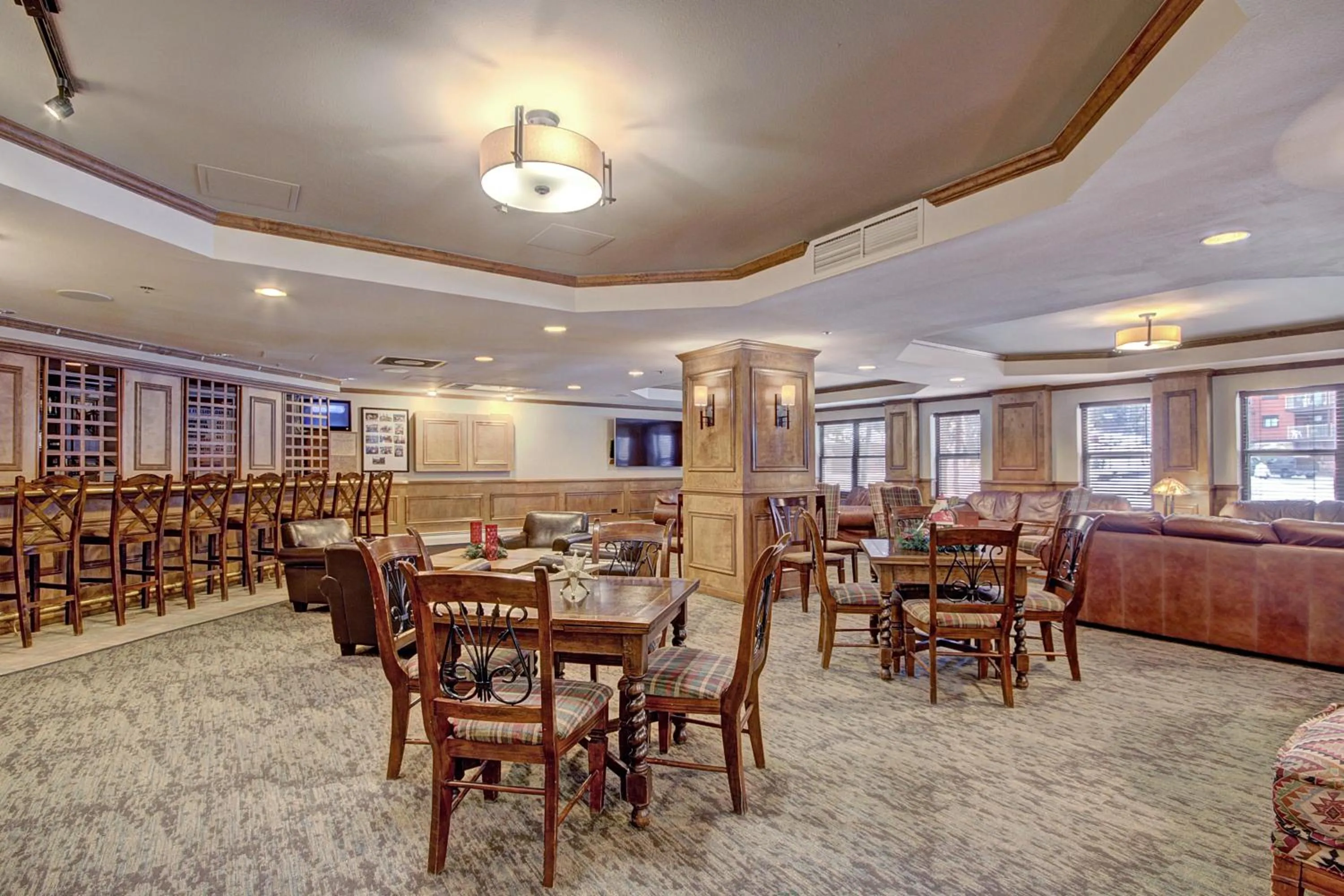 Communal lounge/ TV room in River Mountain Lodge by Breckenridge Hospitality