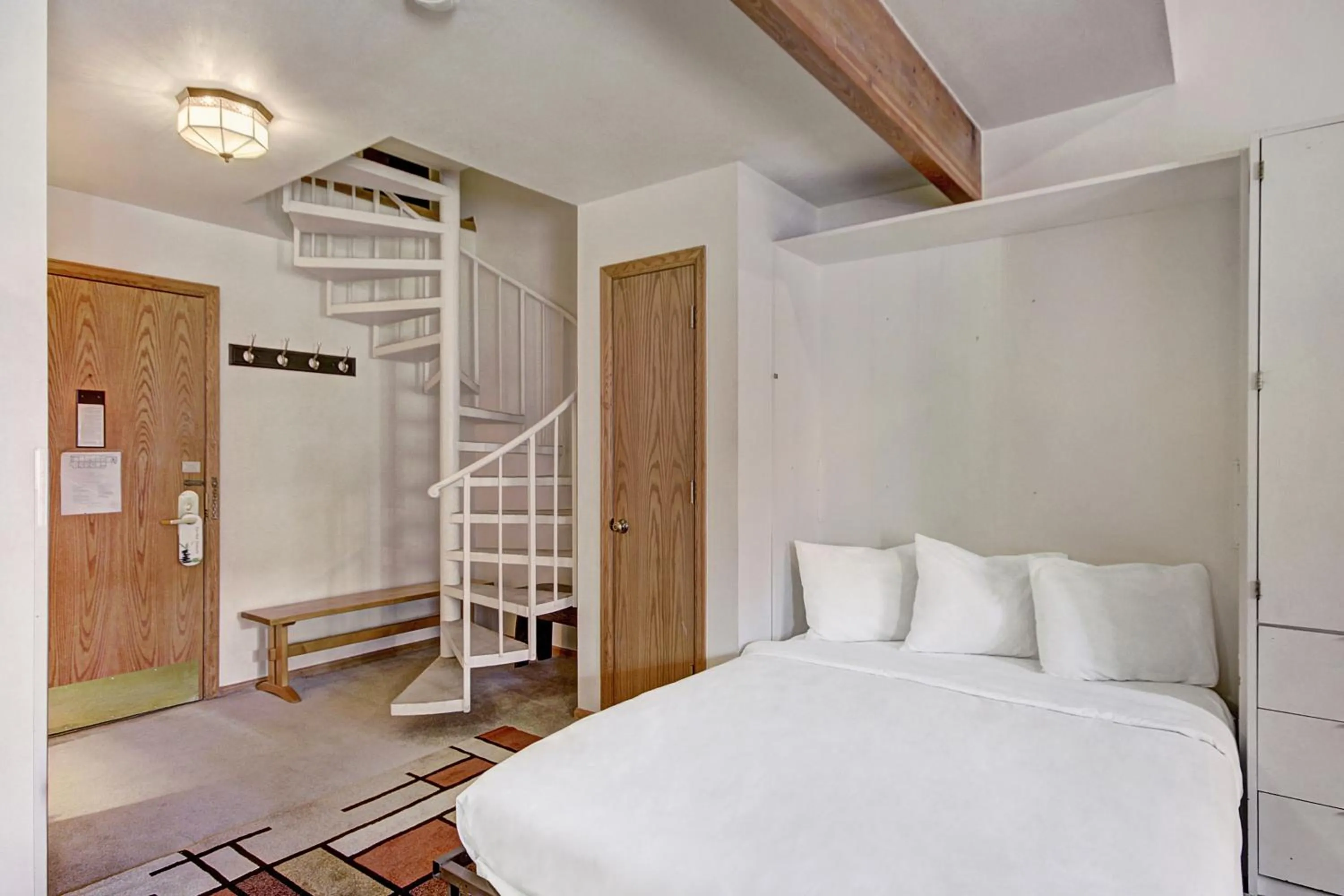 Bed in River Mountain Lodge by Breckenridge Hospitality