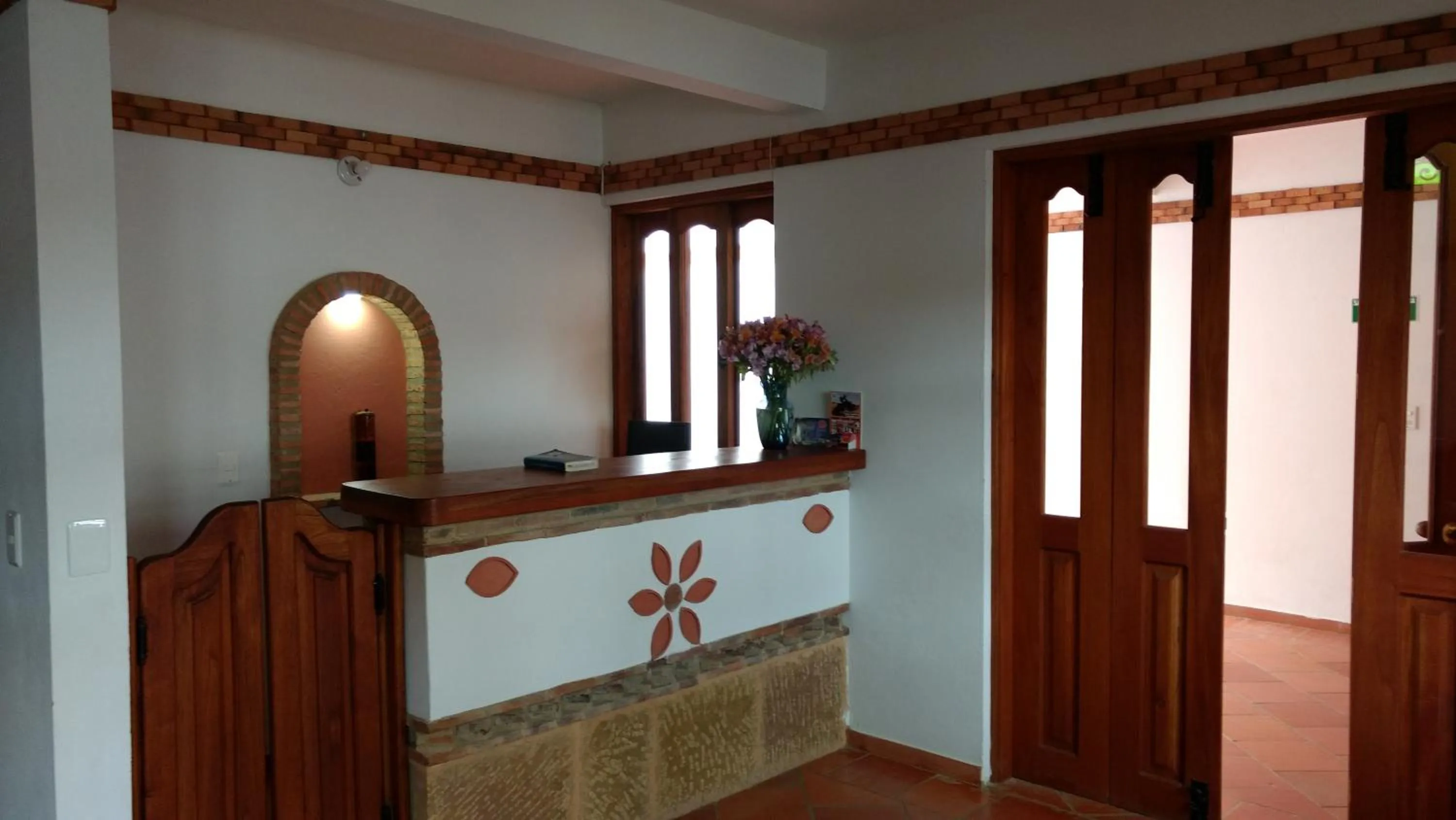 Lobby or reception in Apartahotel La Gran Familia