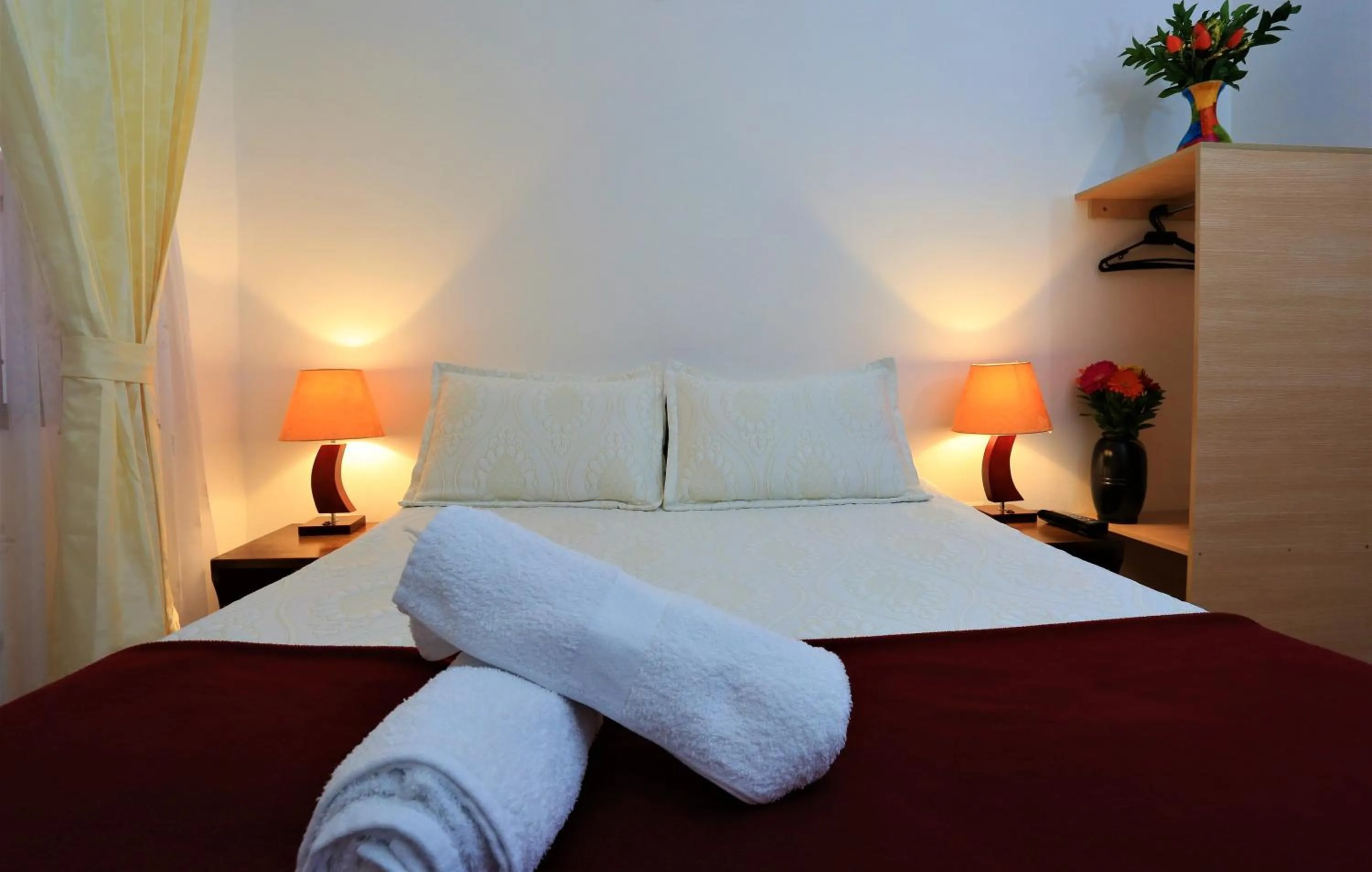 Bed in Apartahotel La Gran Familia