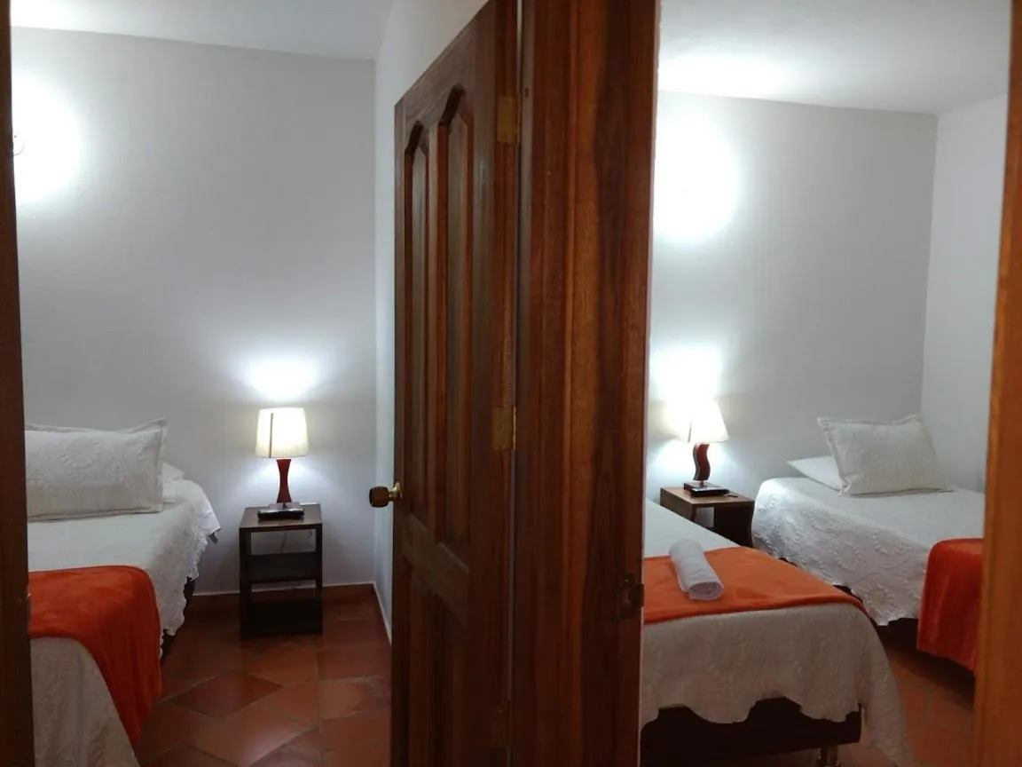 Bed in Apartahotel La Gran Familia