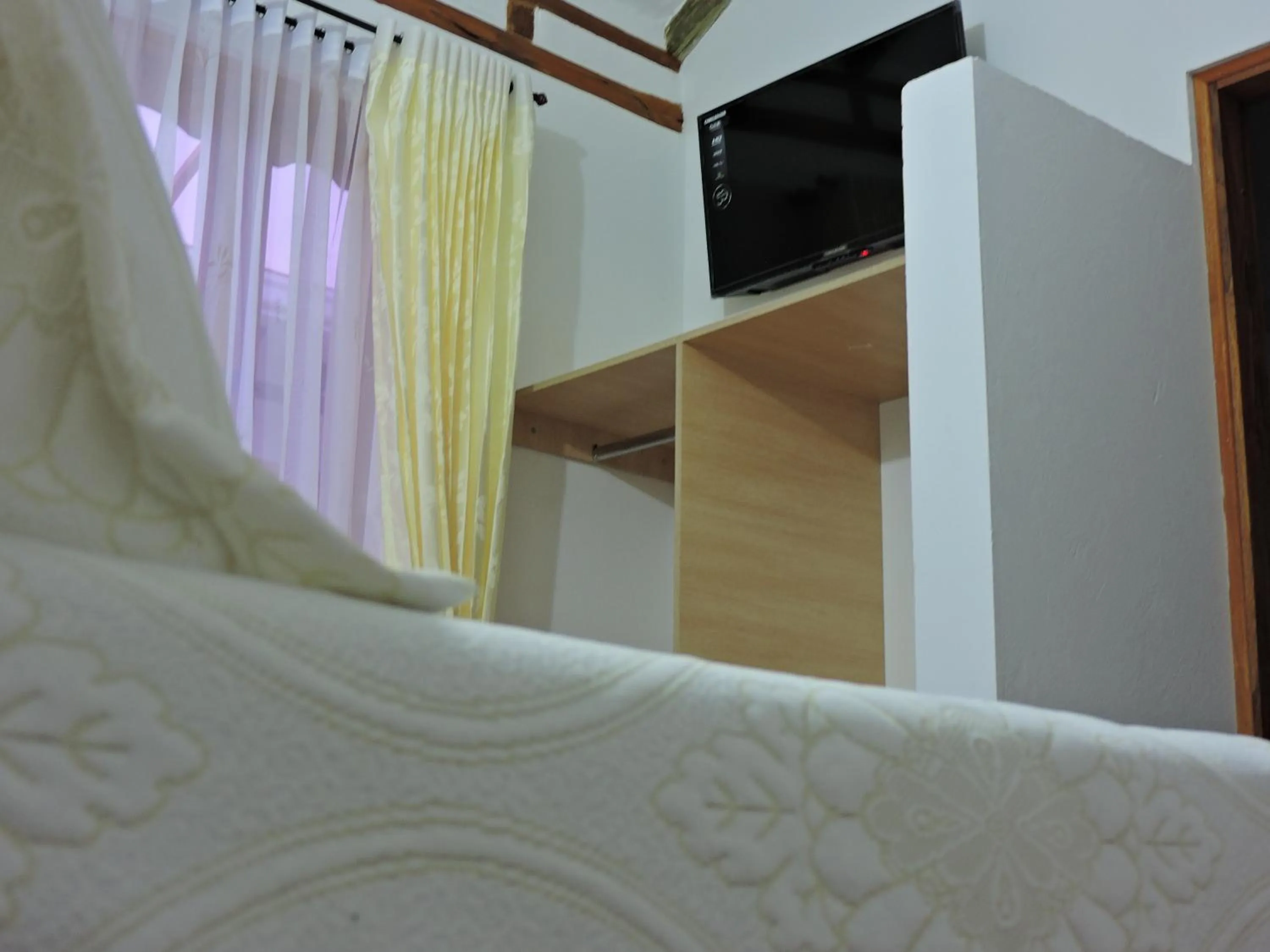 Bed in Apartahotel La Gran Familia