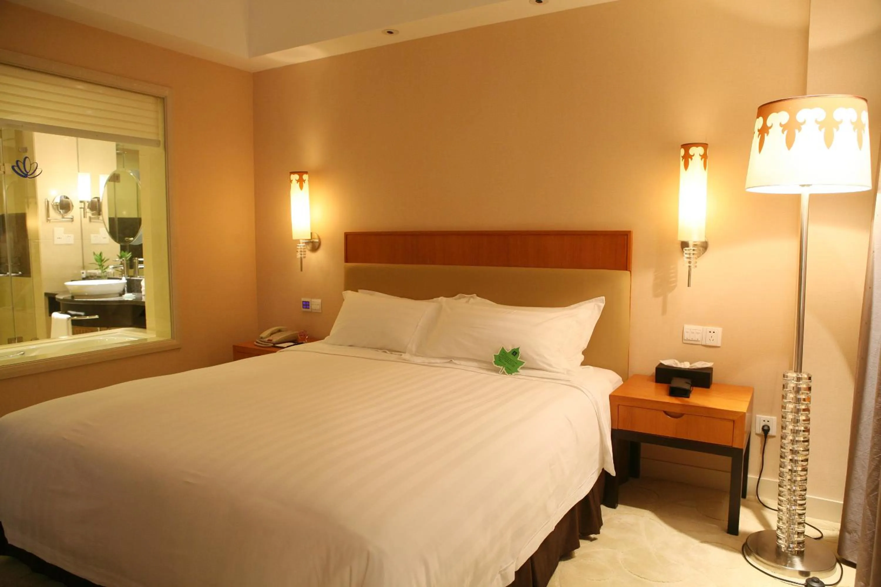 Bed in Dongguan Well Garden Hotel