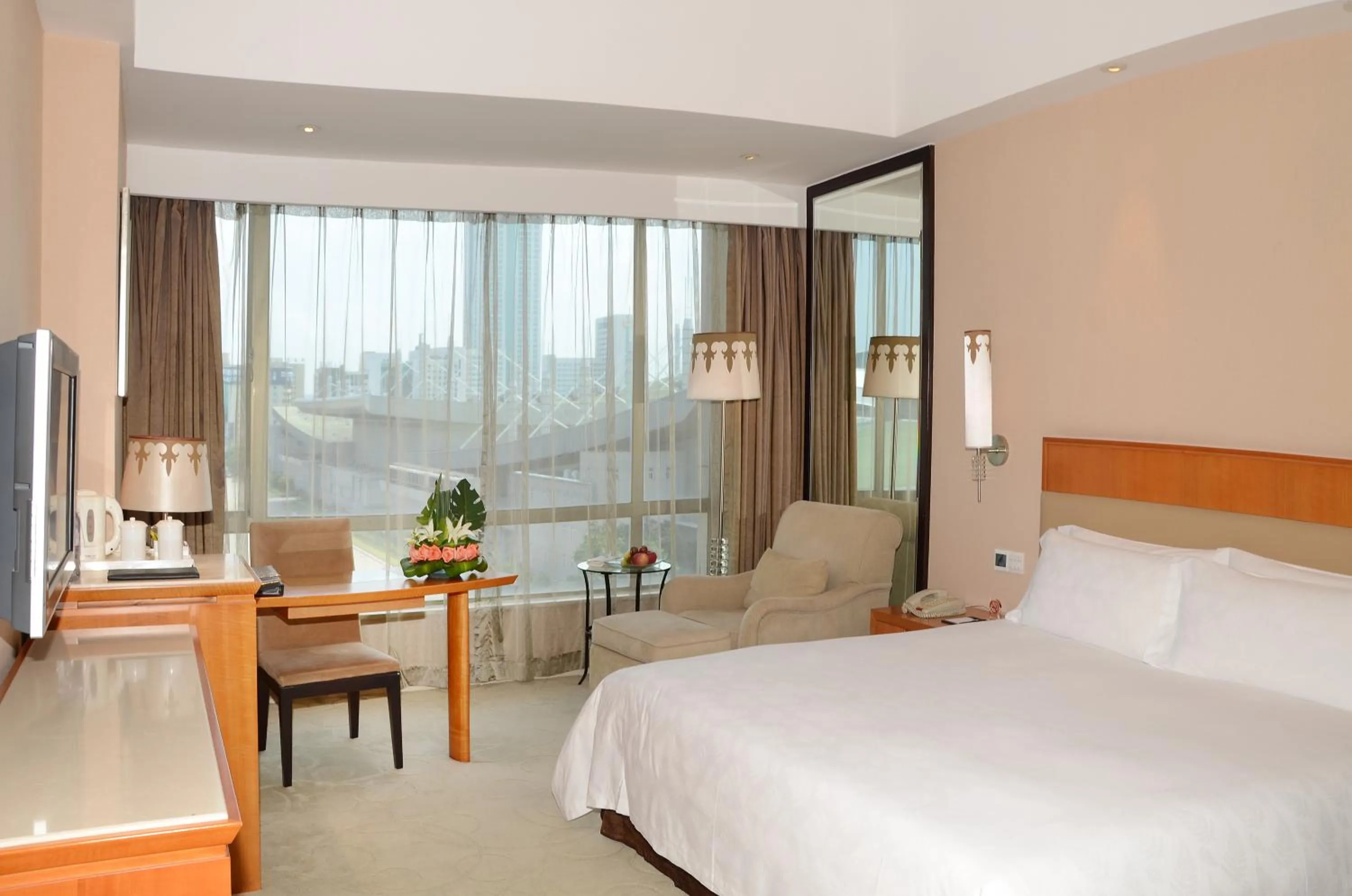 Bed in Dongguan Well Garden Hotel