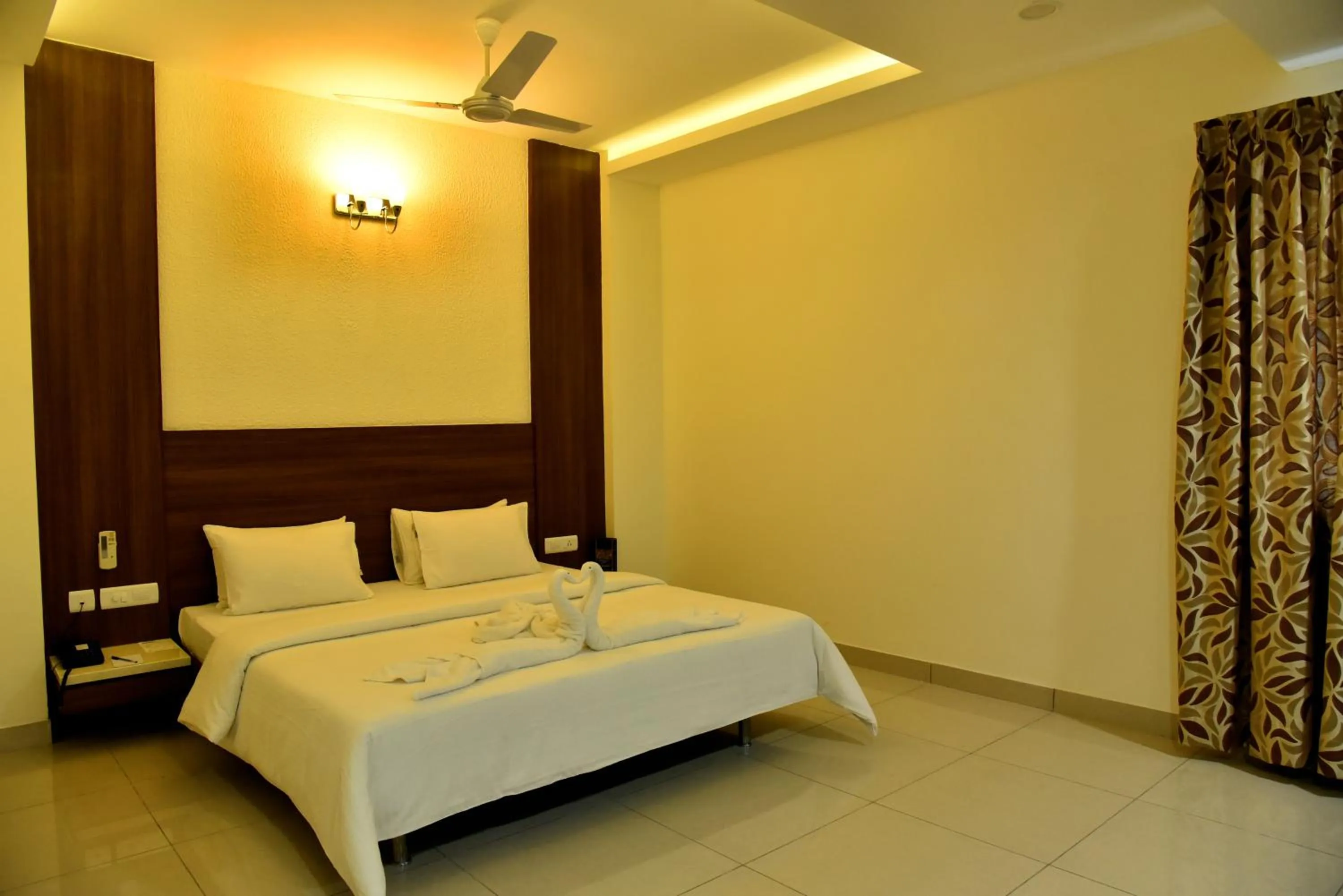 Photo of the whole room, Bed in Rathna Residency