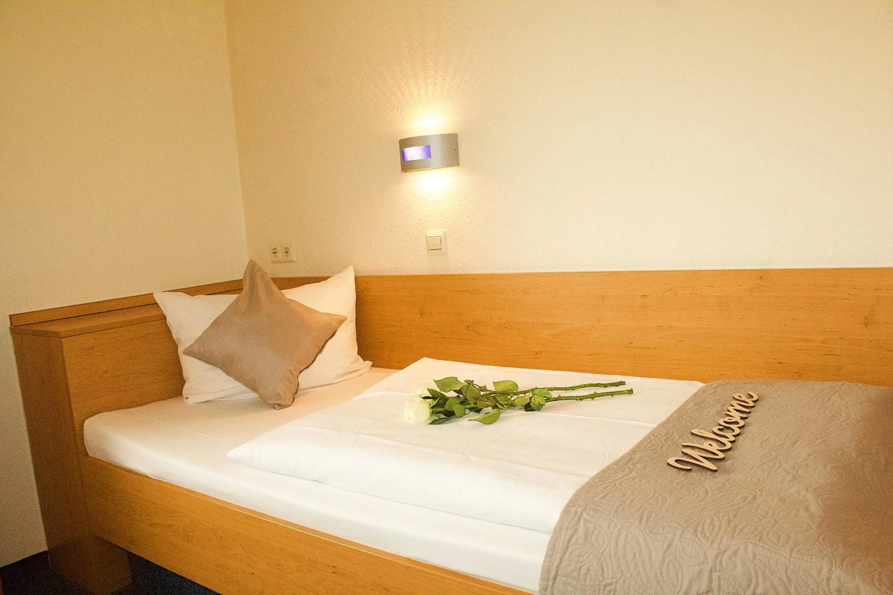 Photo of the whole room, Bed in Hotel Austria Stuttgart-City