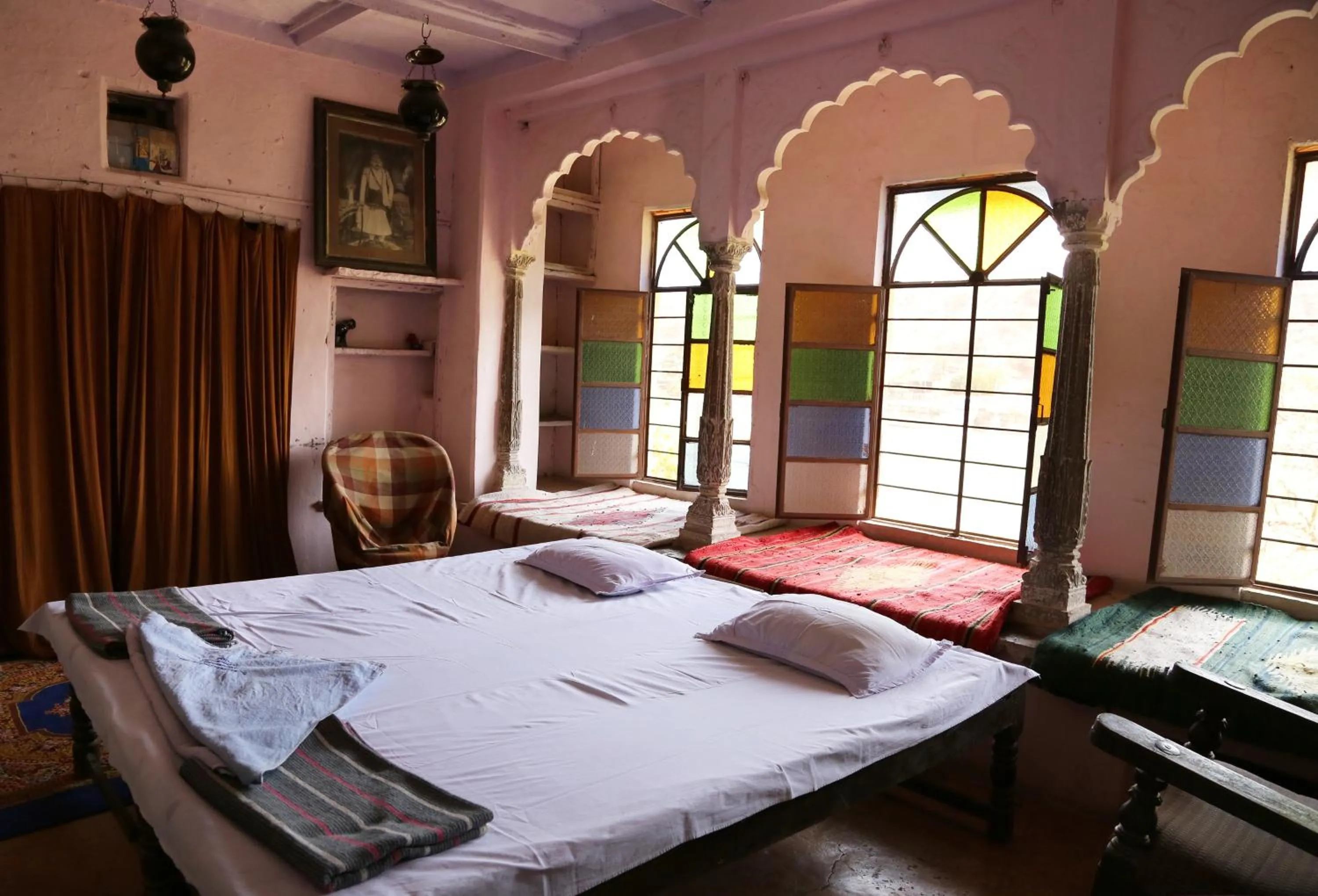 Bed in Haveli Uma Megh Tourist Guest House
