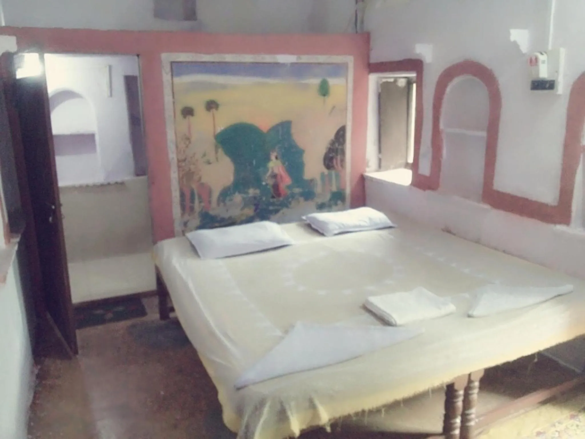 Bed in Haveli Uma Megh Tourist Guest House