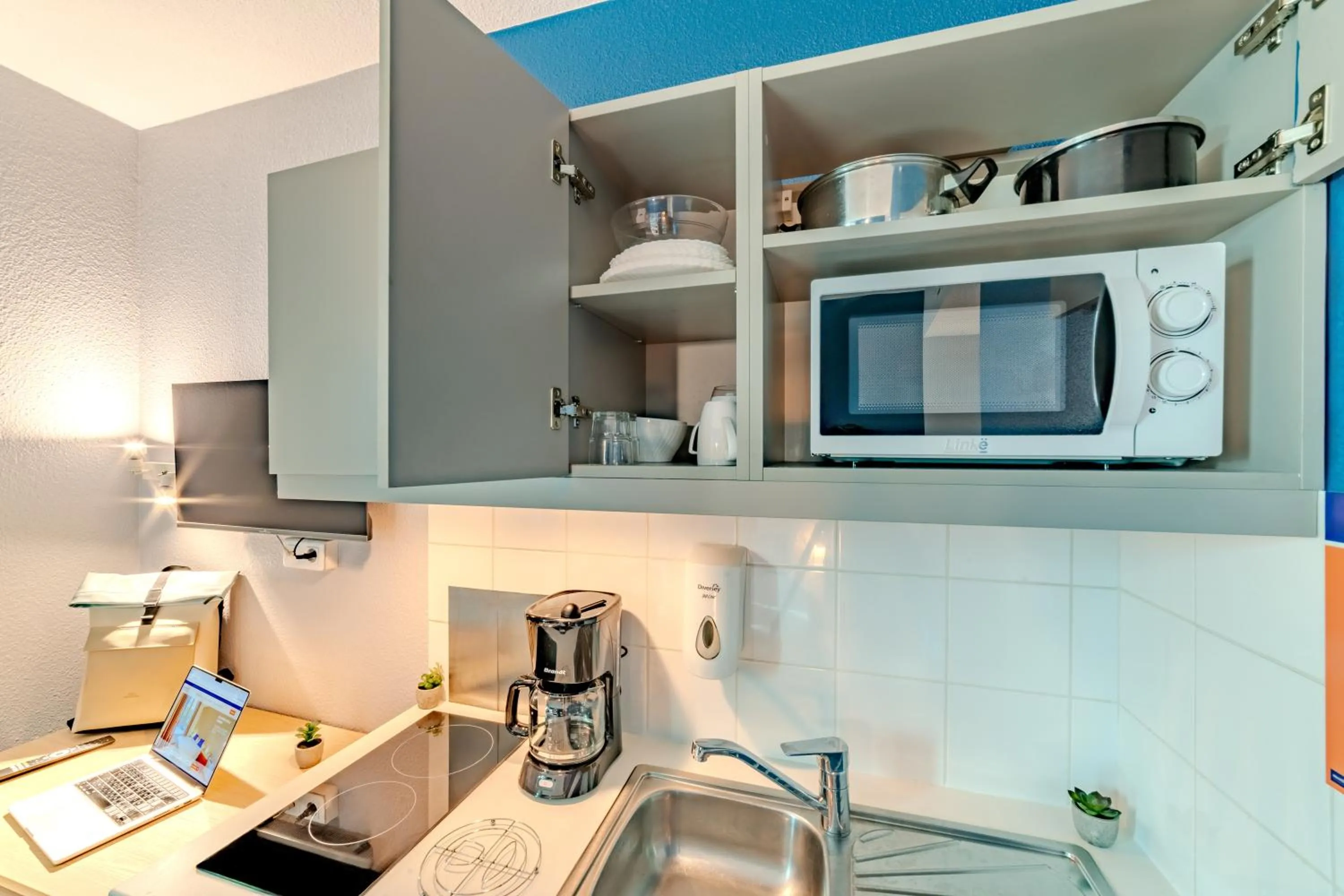 Kitchen or kitchenette in Montempô Appart'Hôtel Paris-Vélizy