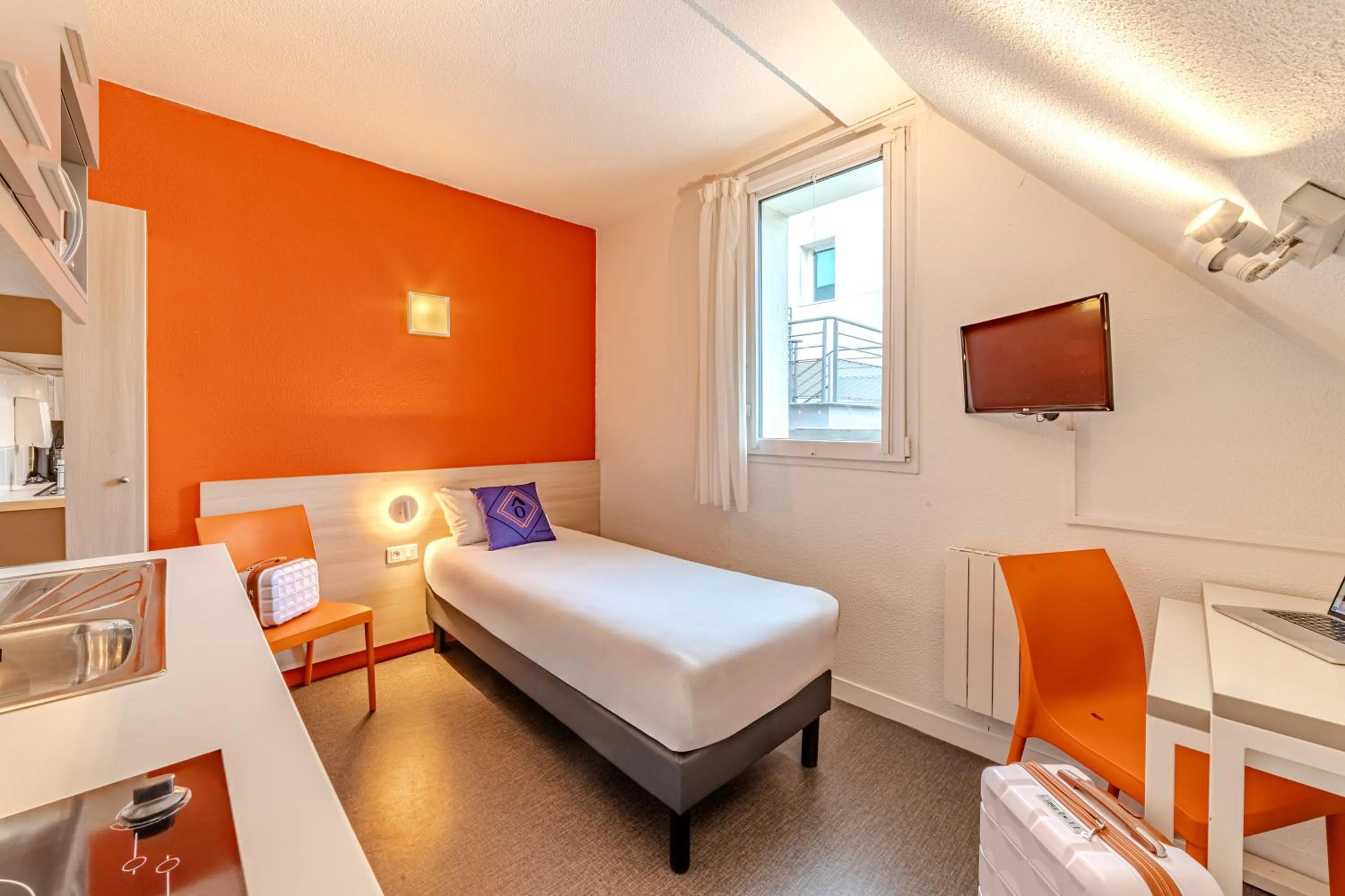 Bed in Montempô Appart'Hôtel Paris-Vélizy