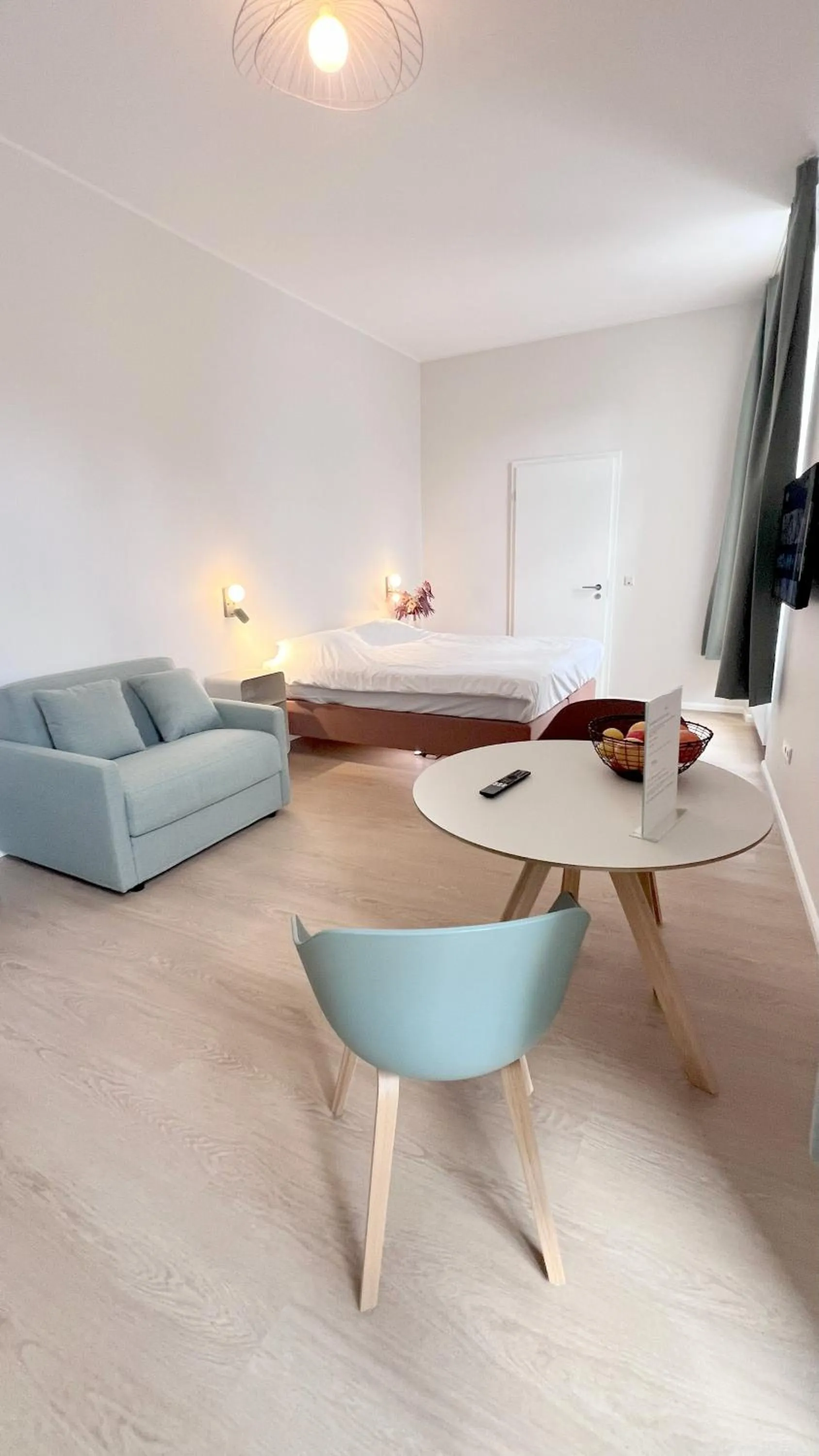 Bed in Key Inn Appart Hotel Belair