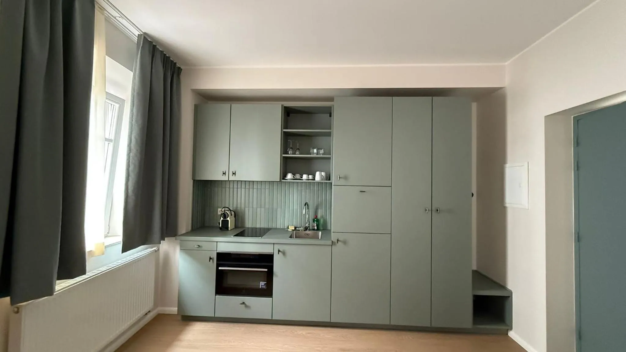 stove in Key Inn Appart Hotel Belair