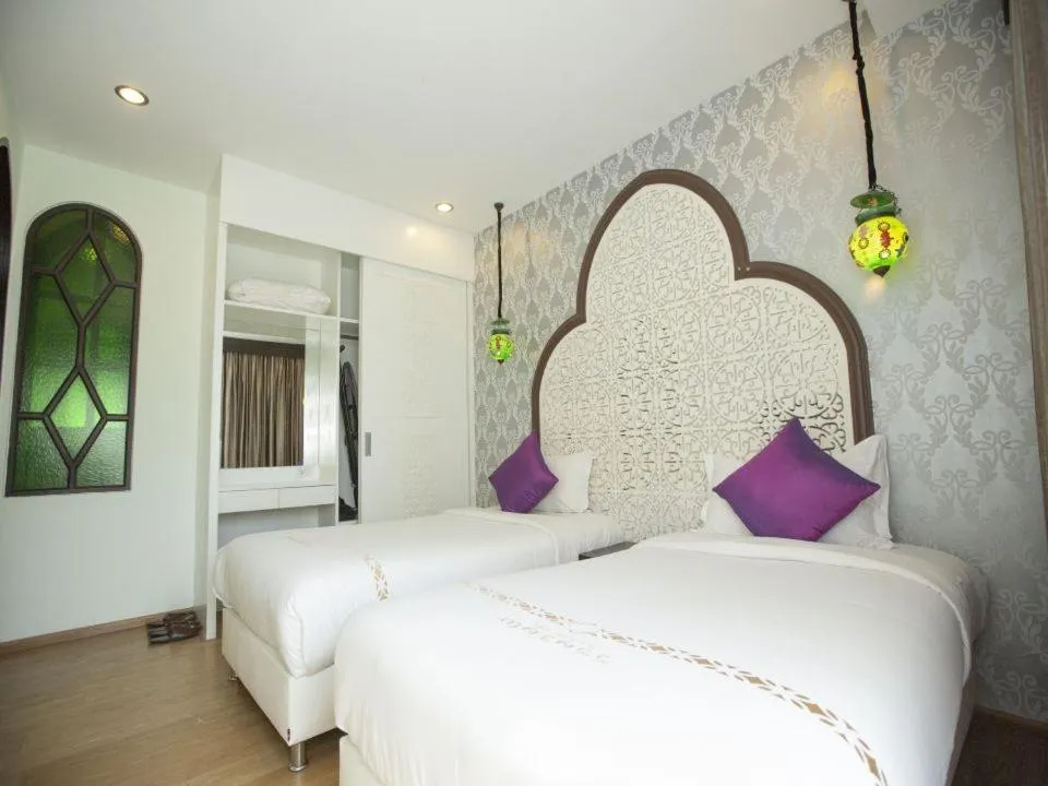 Bed in The Grand Morocc Hotel