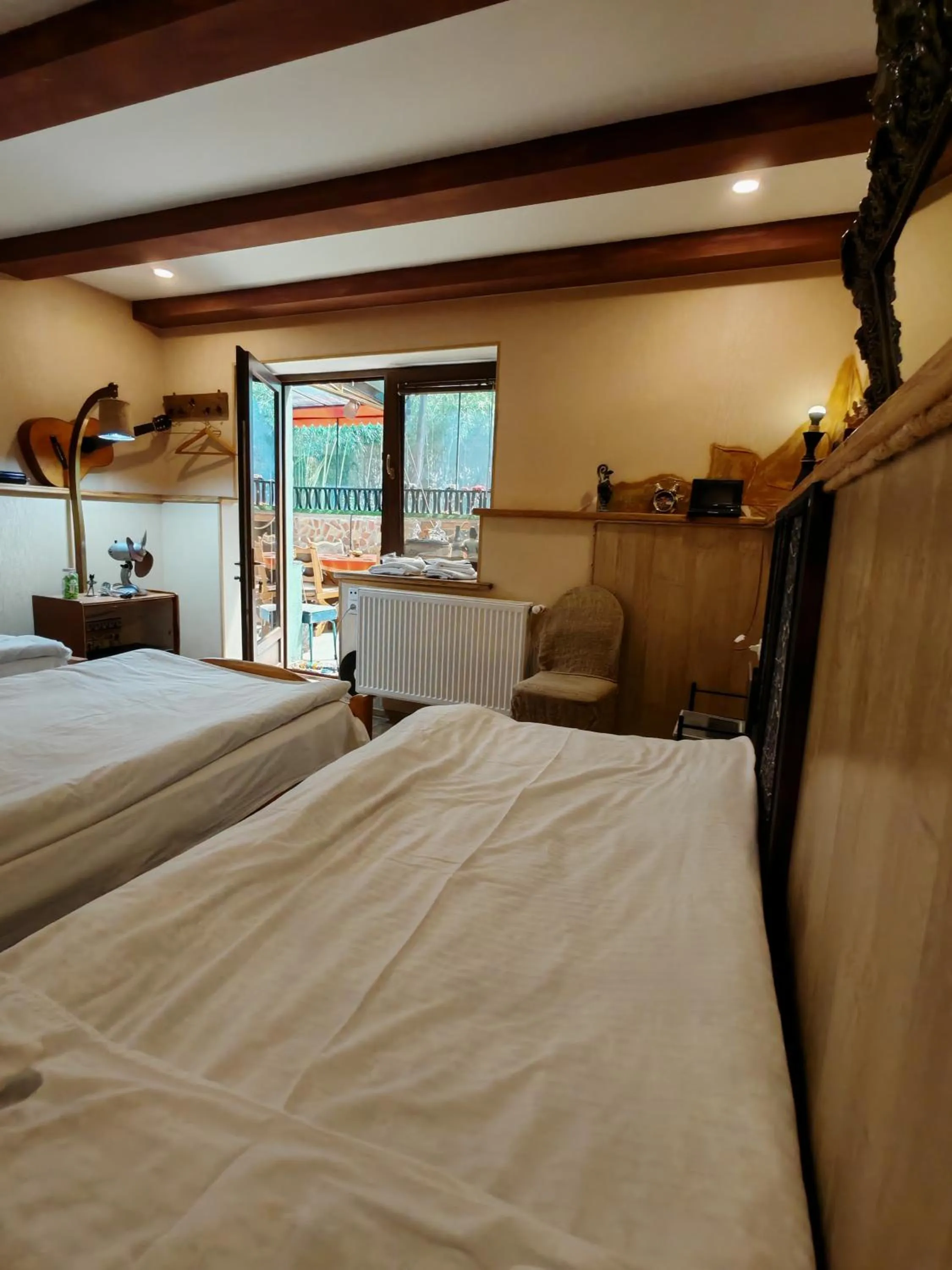 Bed in Qilimcha's Guesthouse-Art Museum