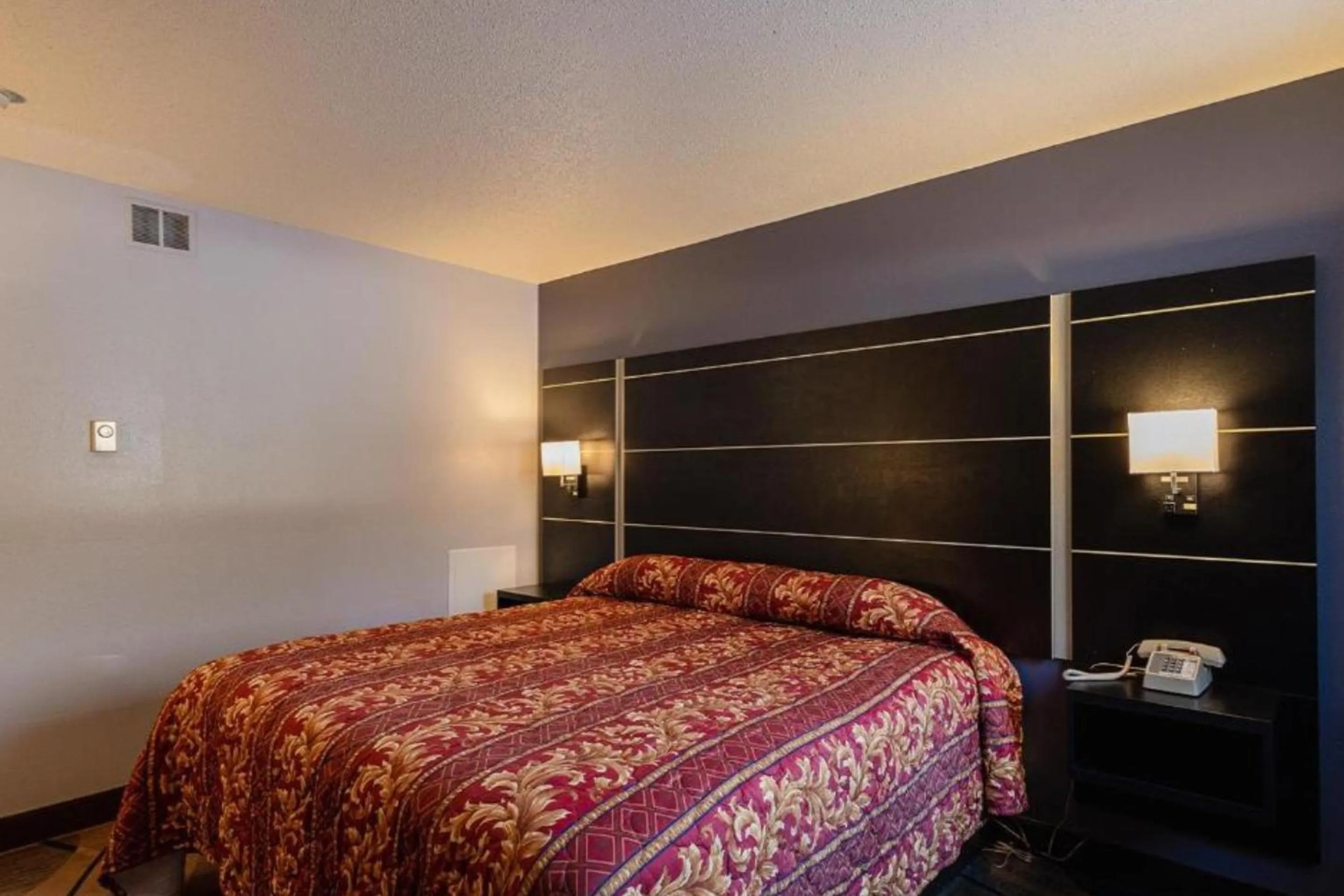 Bedroom, Bed in Coratel Inn & Suites by Jasper Hastings