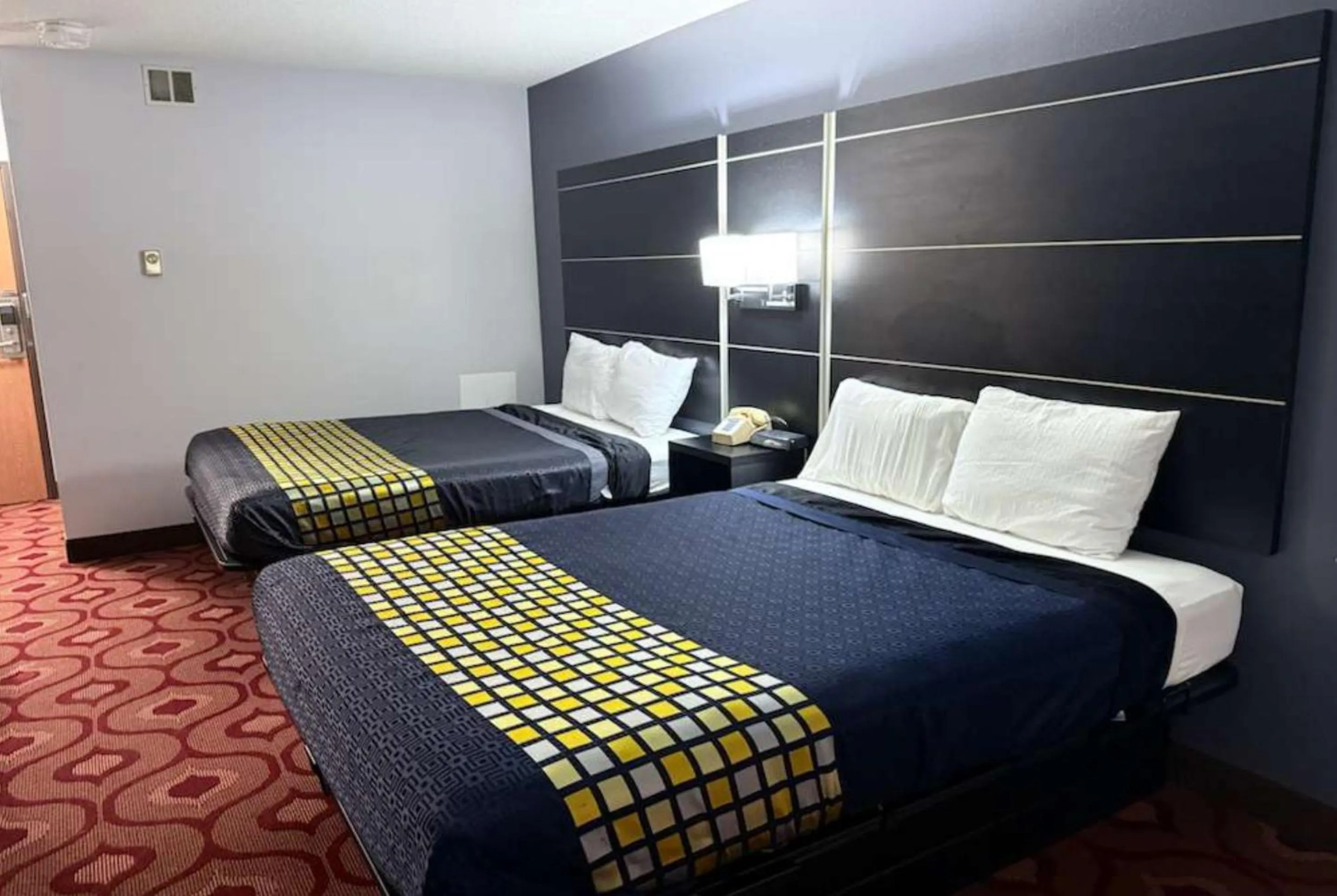 Bedroom, Bed in Coratel Inn & Suites by Jasper Hastings