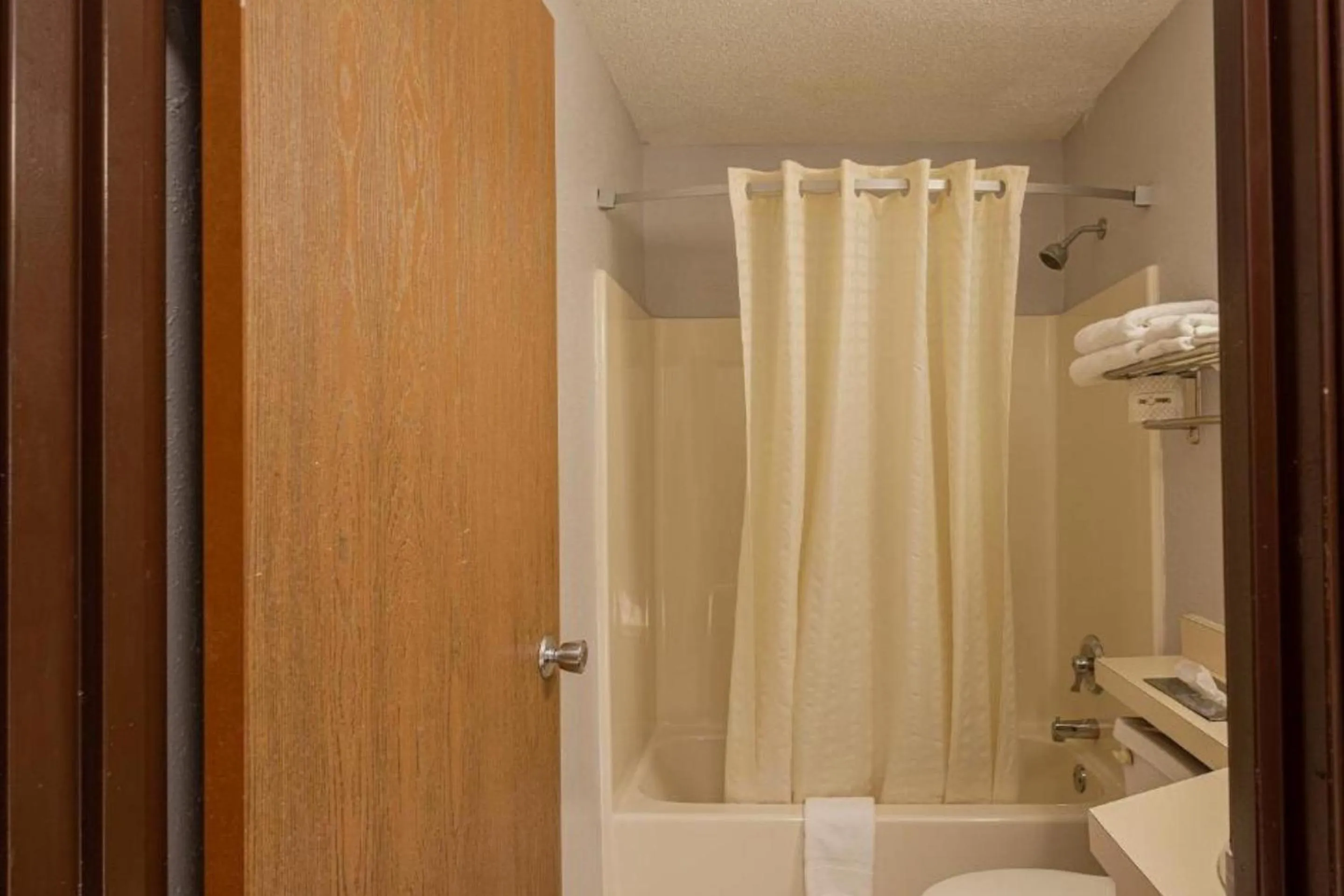 Bathroom in Coratel Inn & Suites by Jasper Hastings