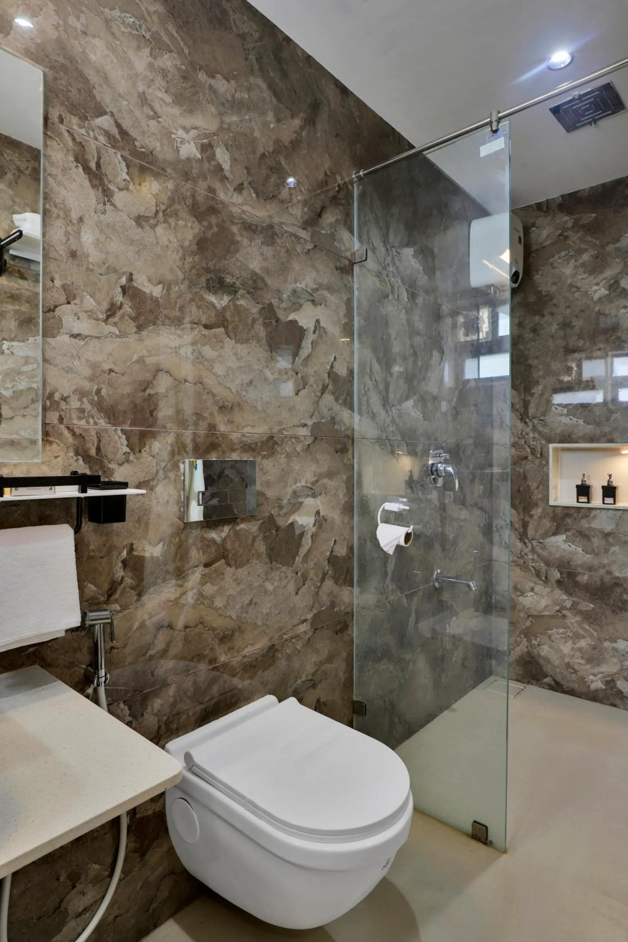 Shower in Goverdhan Greens Resort Dwarka l Hotels In Dwarka