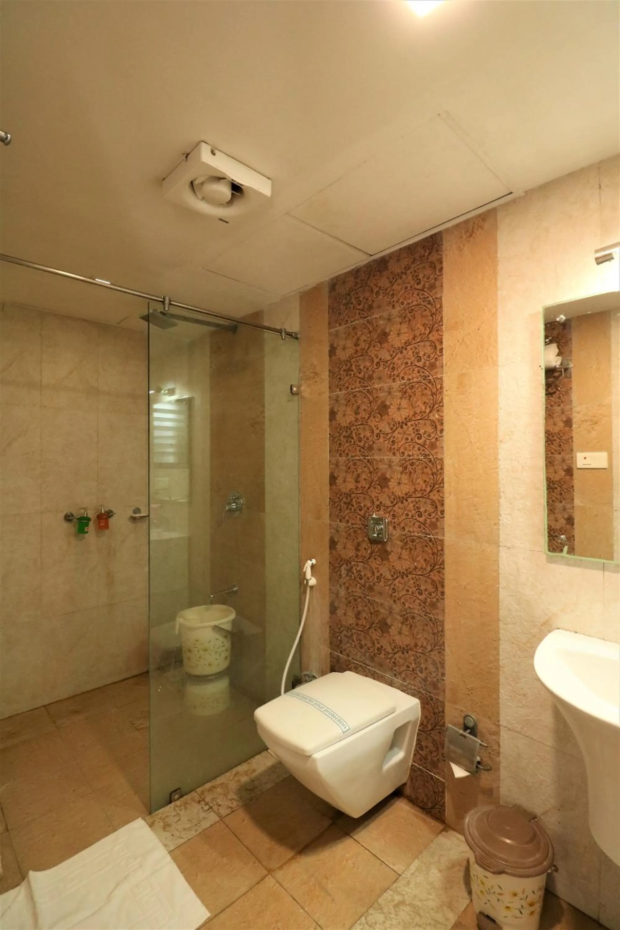 Bathroom in Goverdhan Greens Resort Dwarka l Hotels In Dwarka