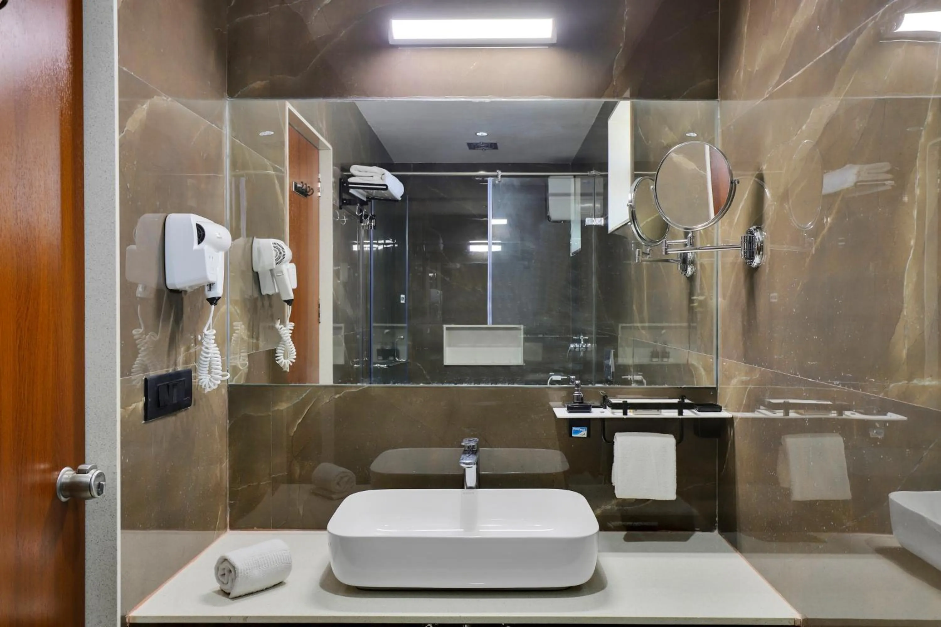 Shower in Goverdhan Greens Resort Dwarka l Hotels In Dwarka
