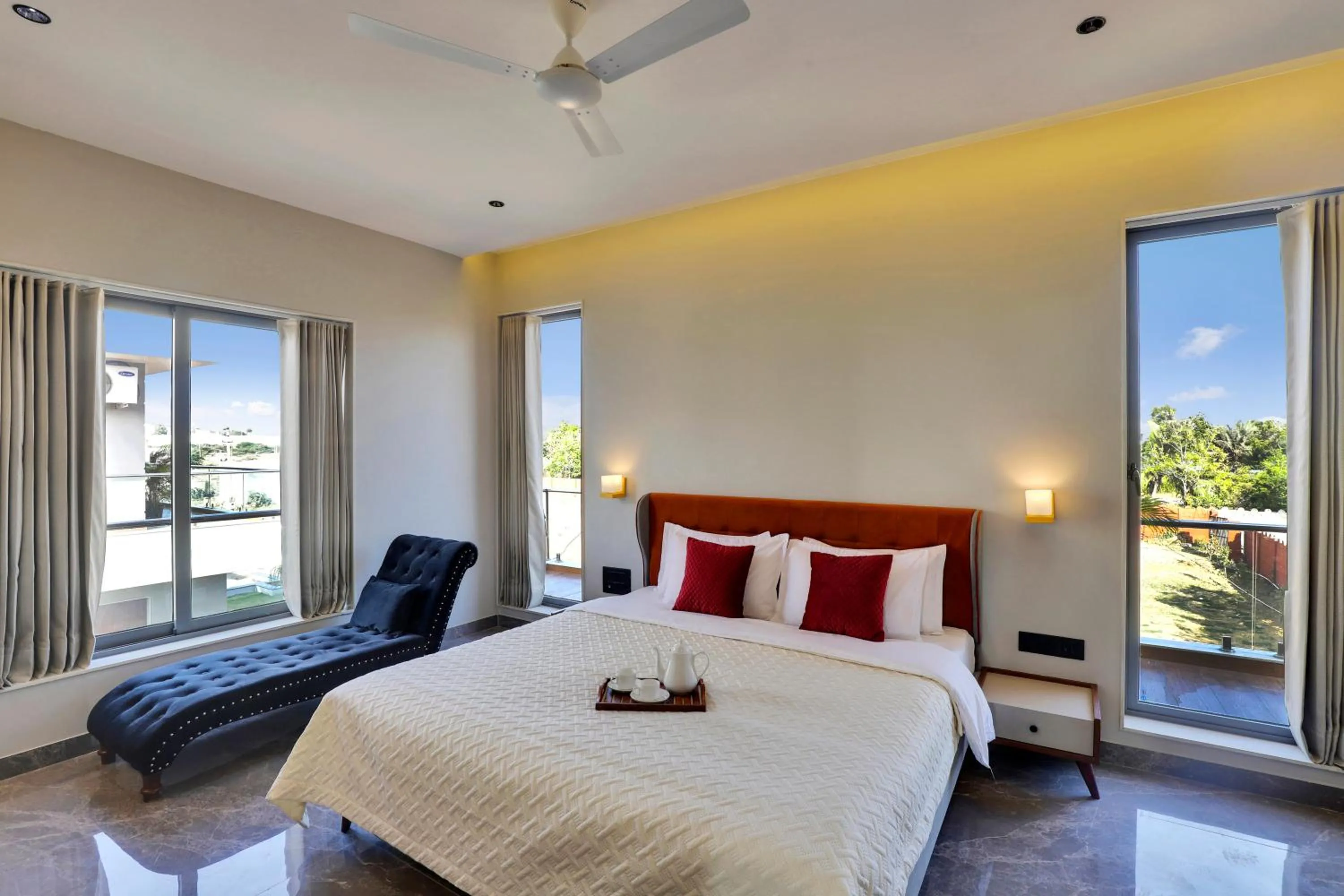 Photo of the whole room, Bed in Goverdhan Greens Resort Dwarka l Hotels In Dwarka