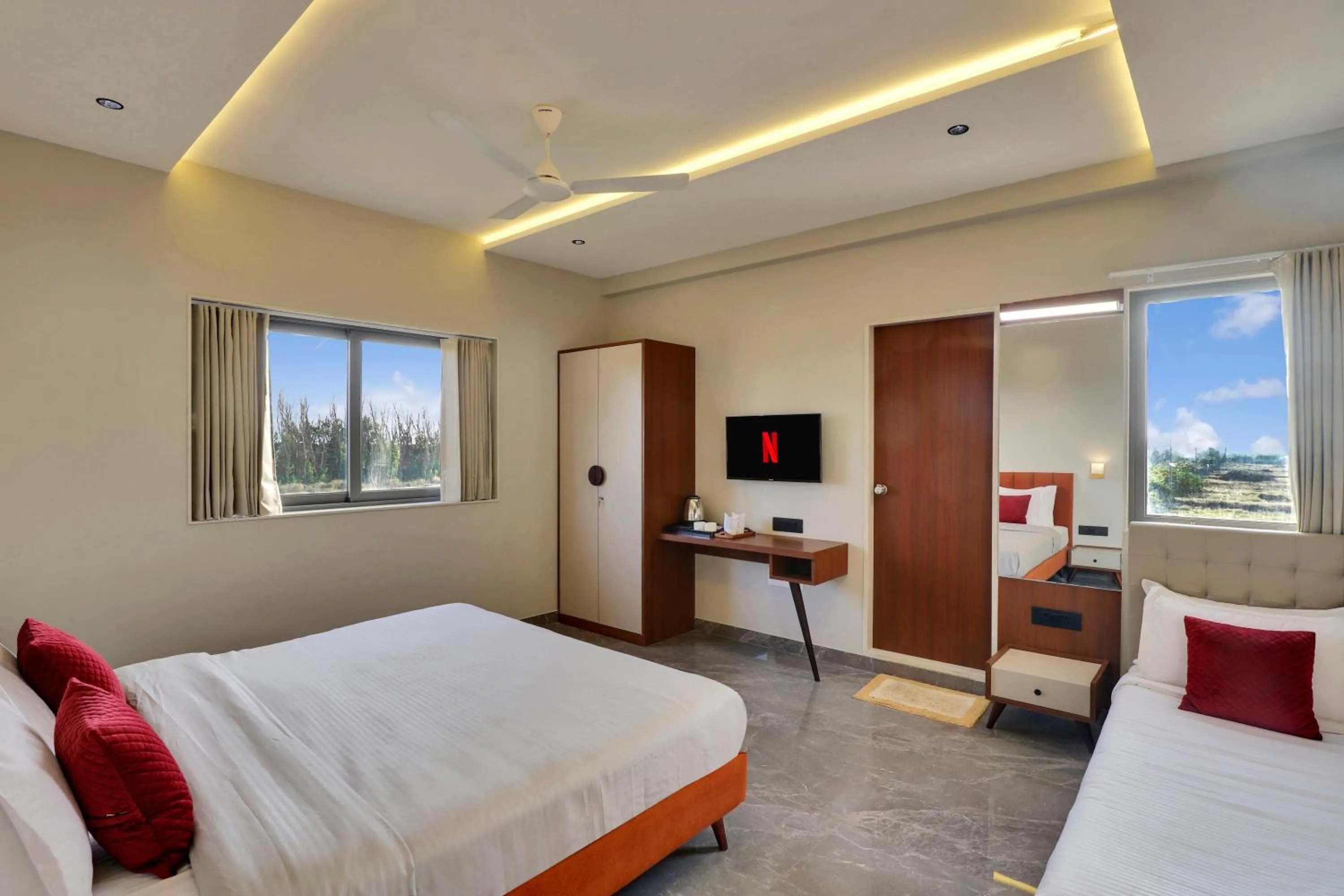 Bedroom, Bed in Goverdhan Greens Resort Dwarka l Hotels In Dwarka