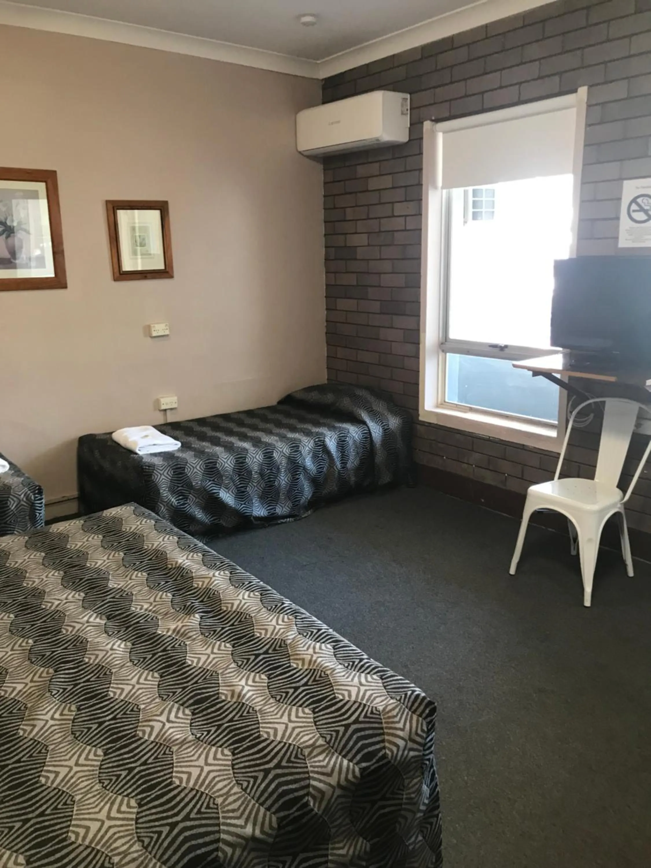 Bed in Downtown Motel