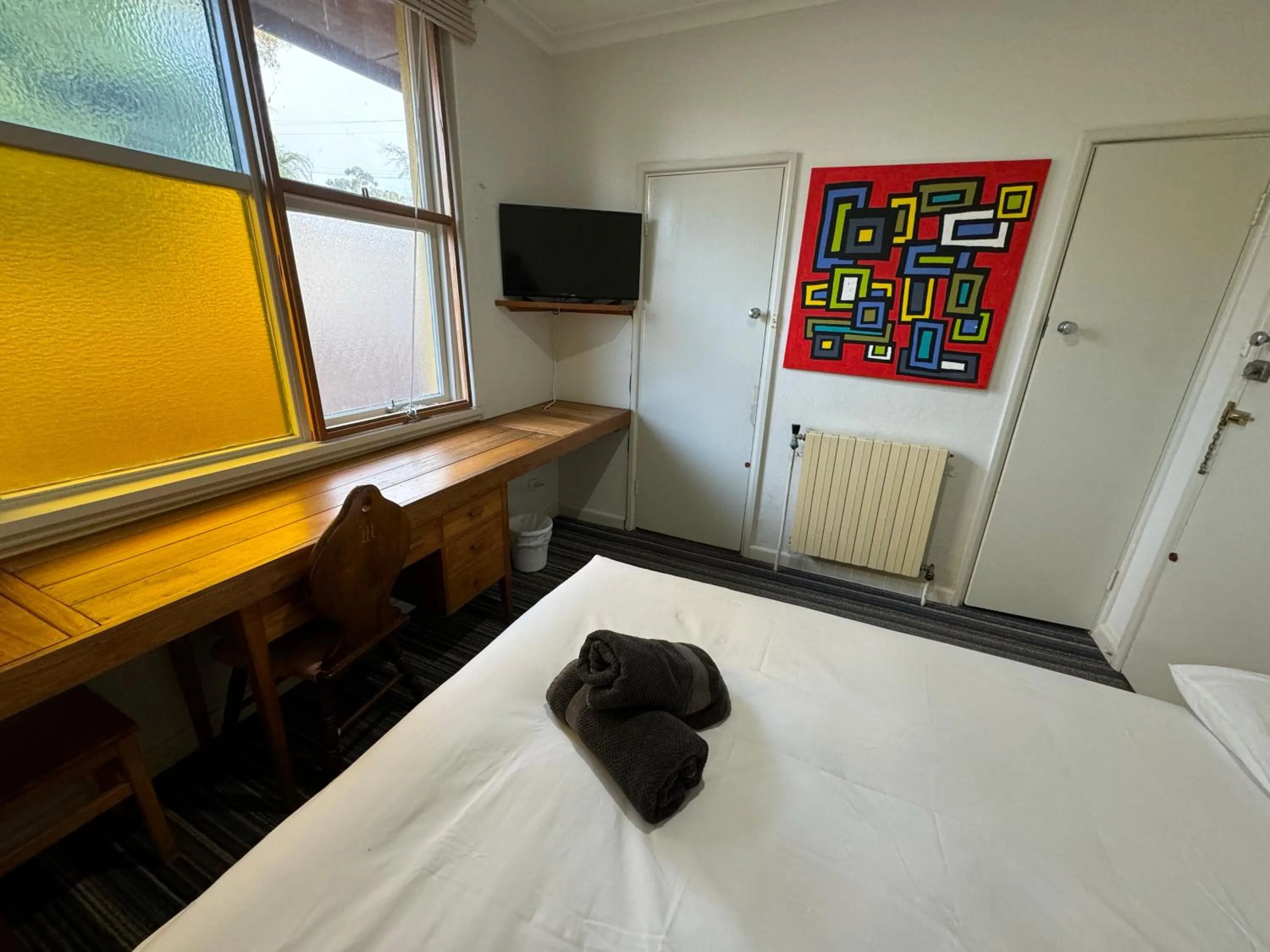 Bed in Bunkhouse Motel Cooma