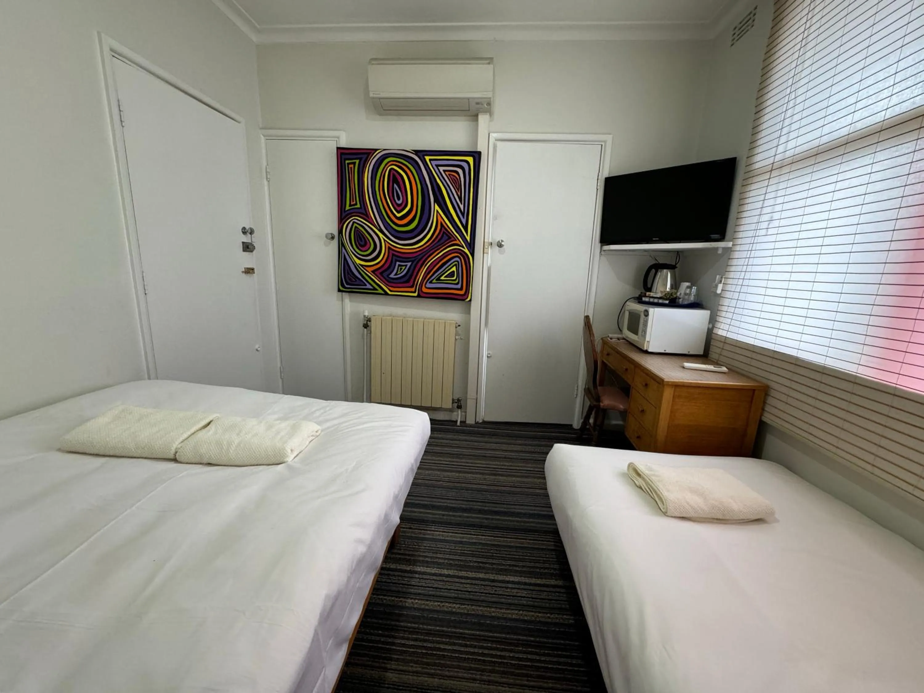 Bed in Bunkhouse Motel Cooma