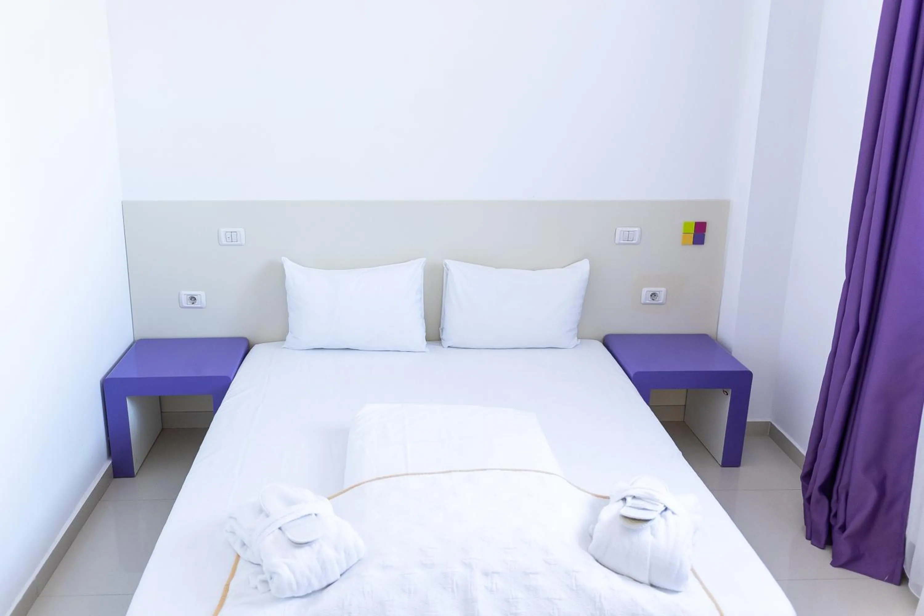 Bed in Hotel Christina Plus