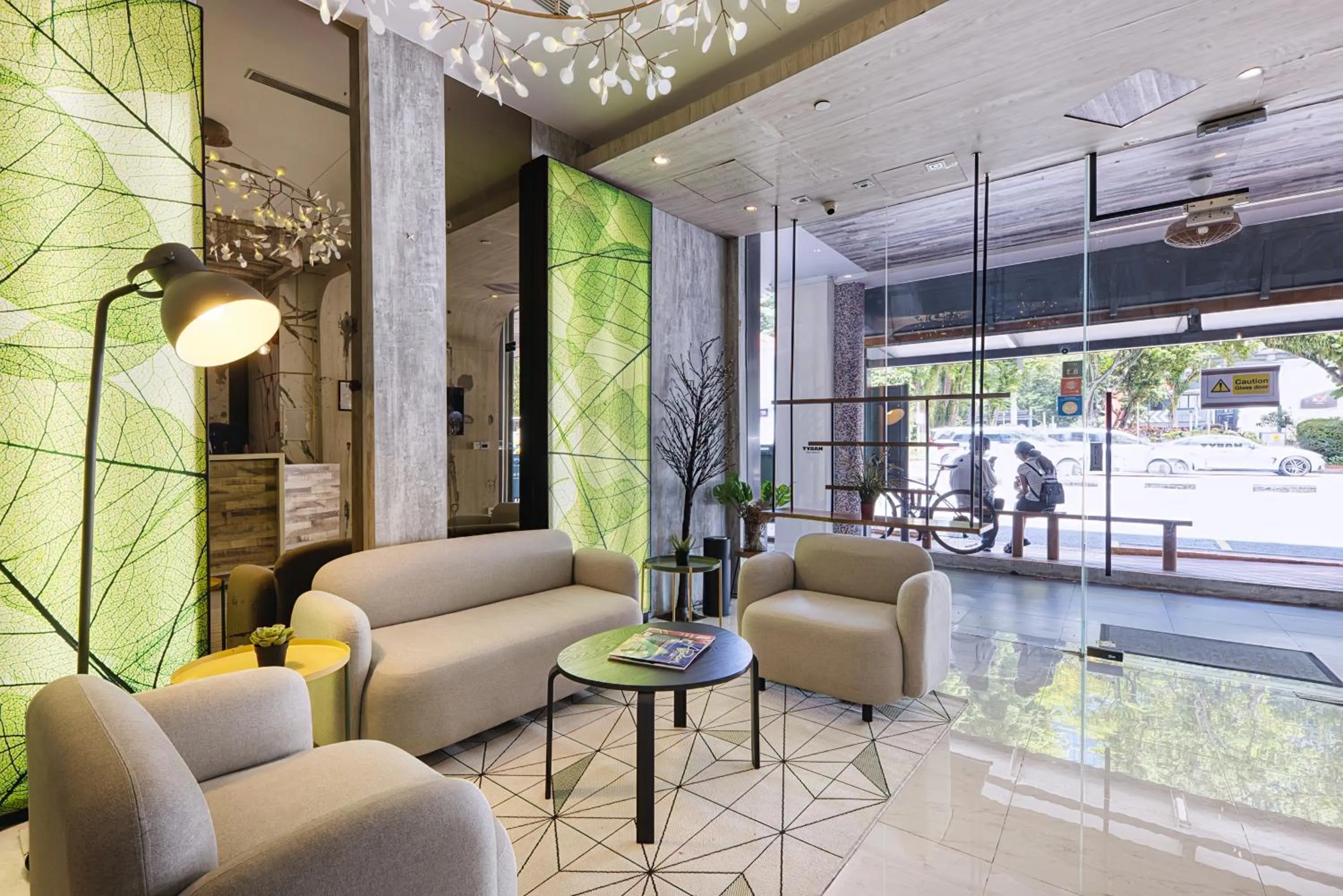 Seating area in Habyt Clarke Quay - Previously Champion City