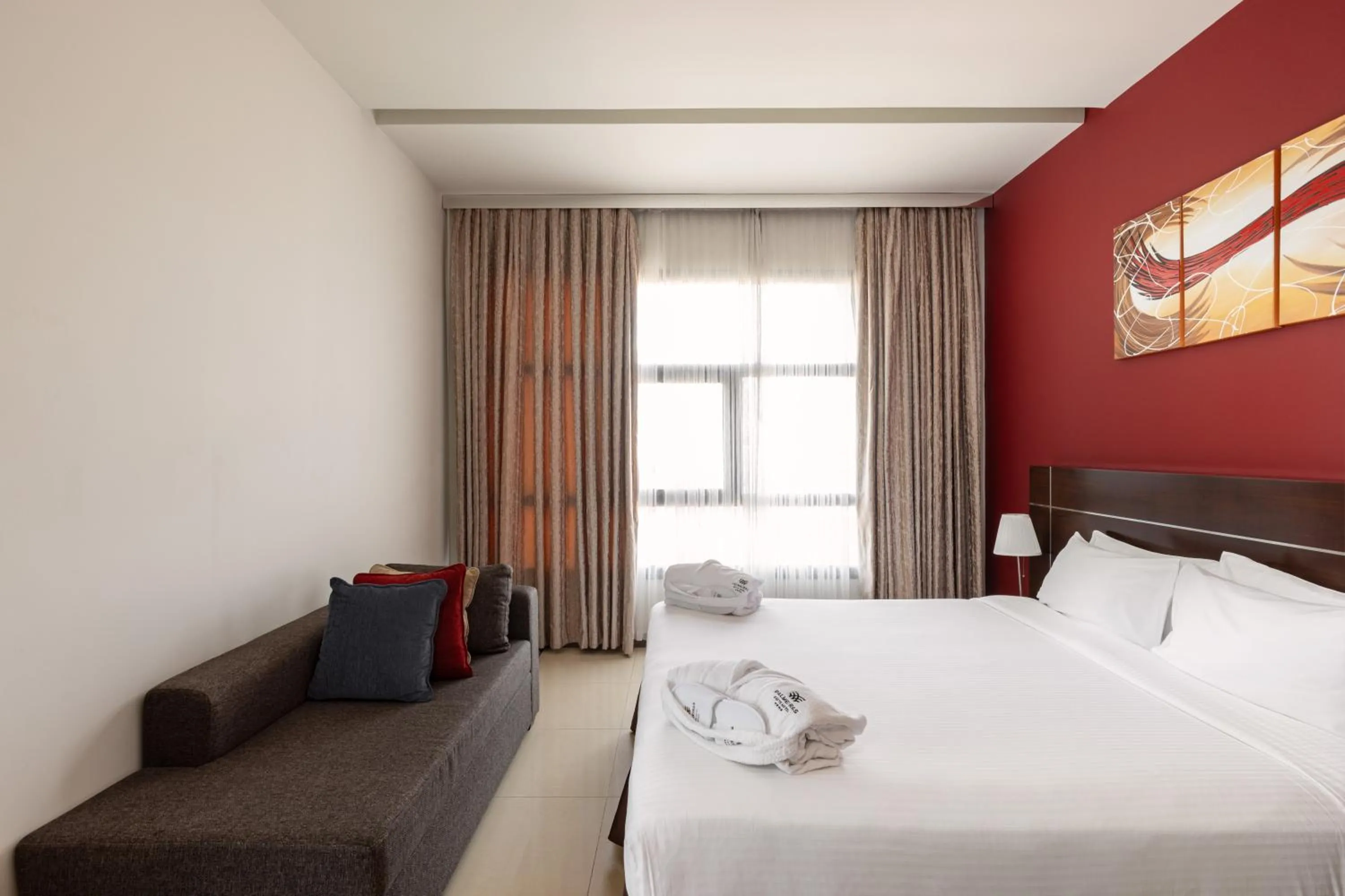 Bedroom in Palmeiras Suite Hotel