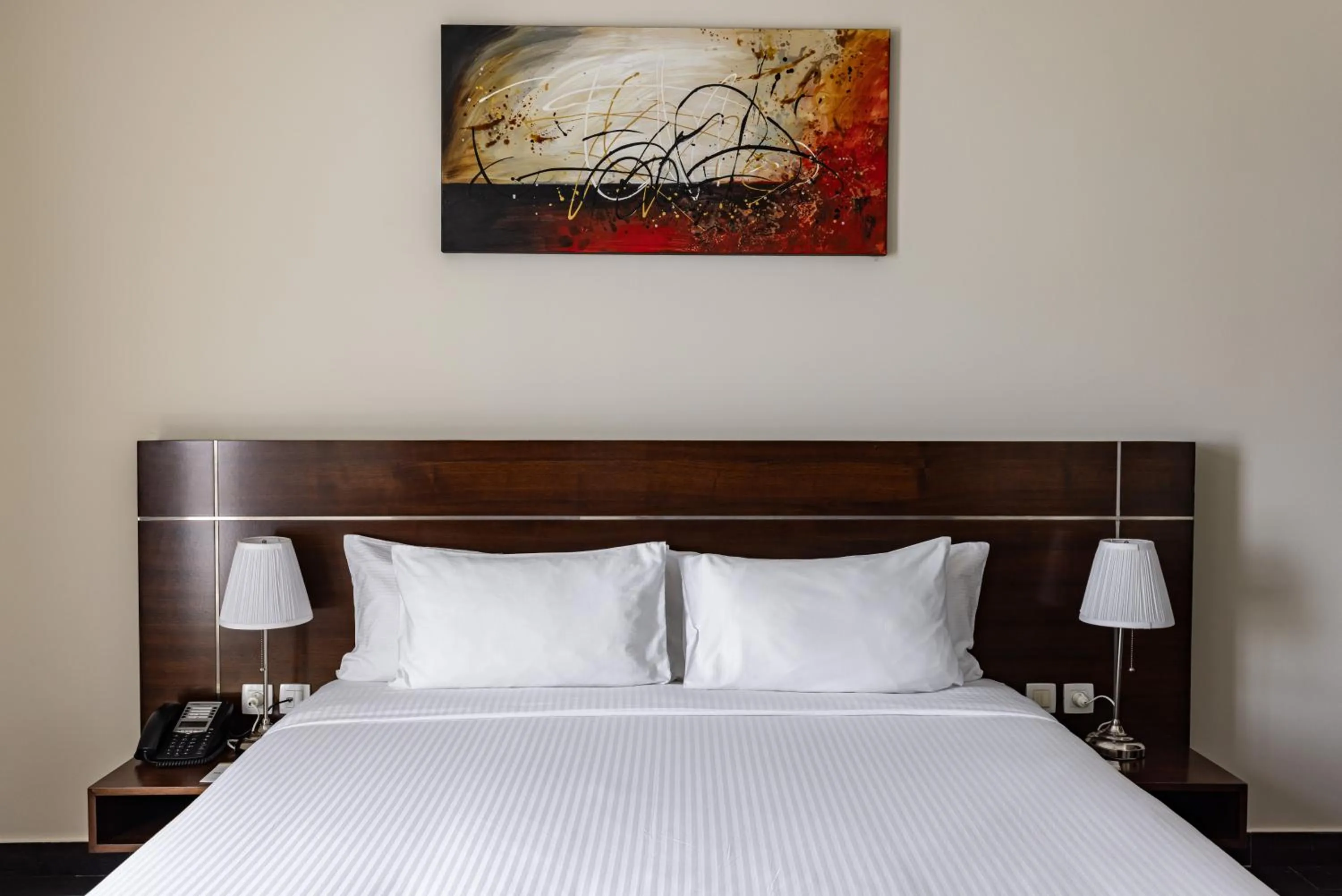 Bed in Palmeiras Suite Hotel