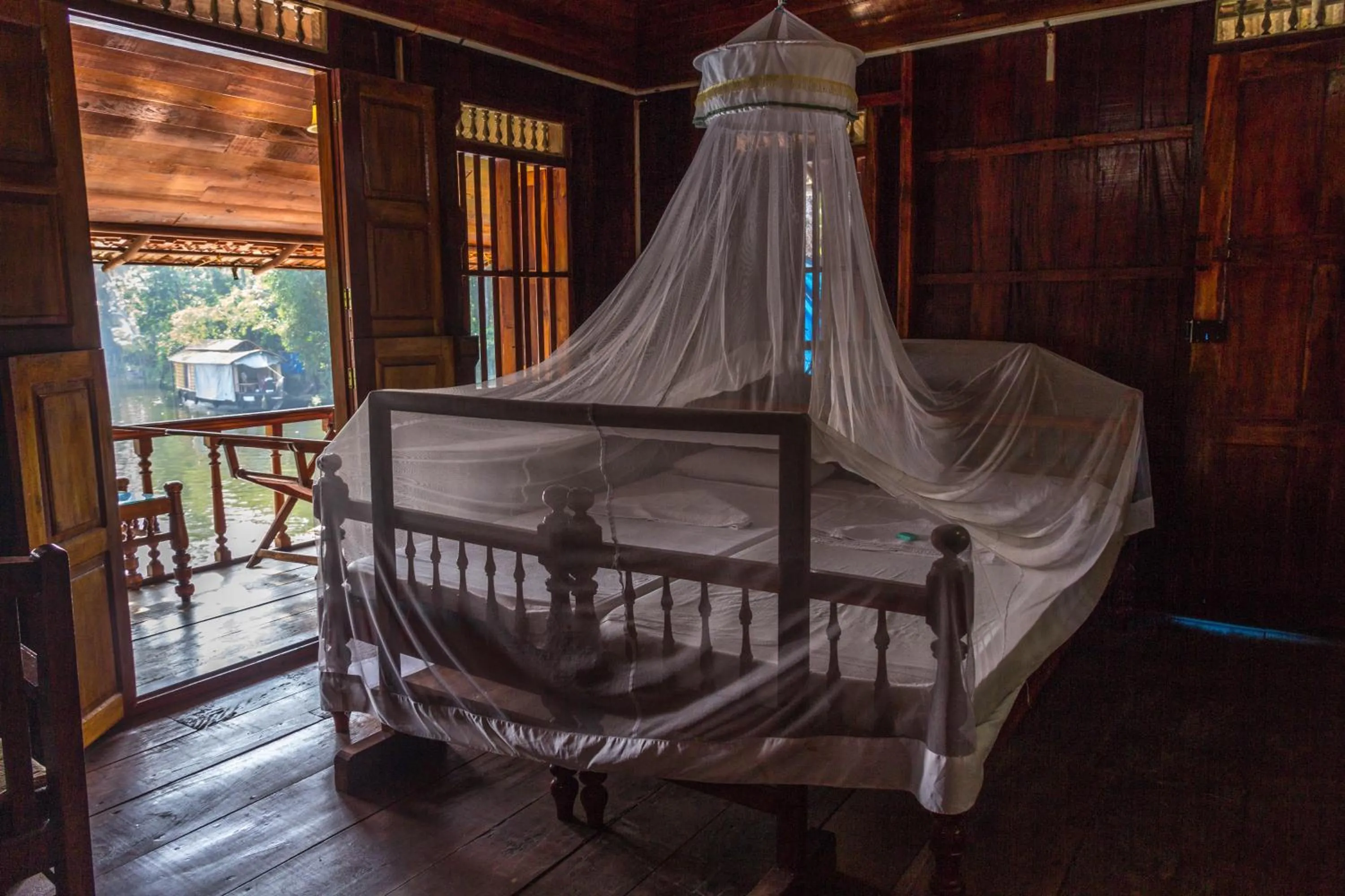 Upper Floor Wooden Room in Malayalam Lake Resort