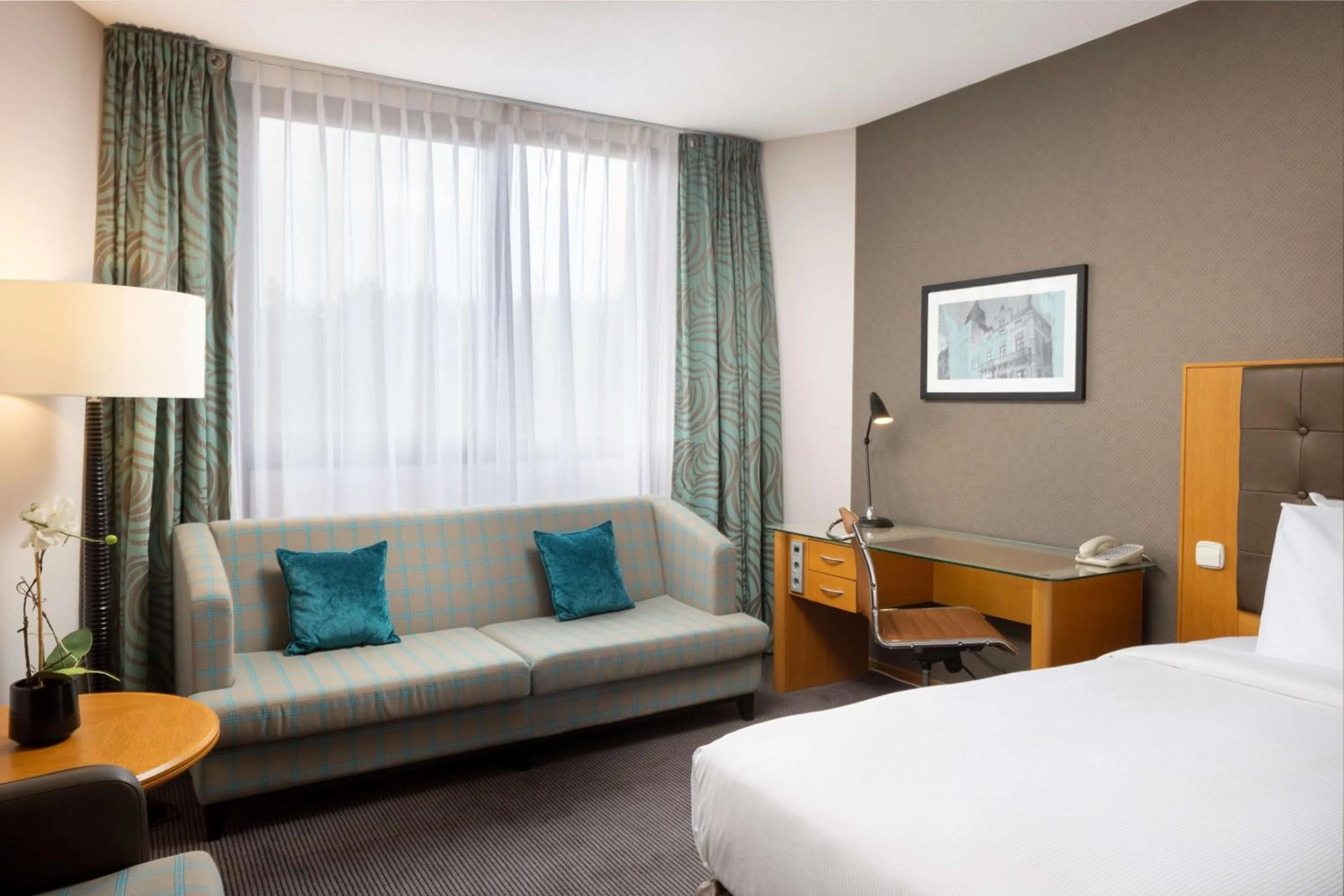 Living room, Bed in DoubleTree by Hilton Luxembourg