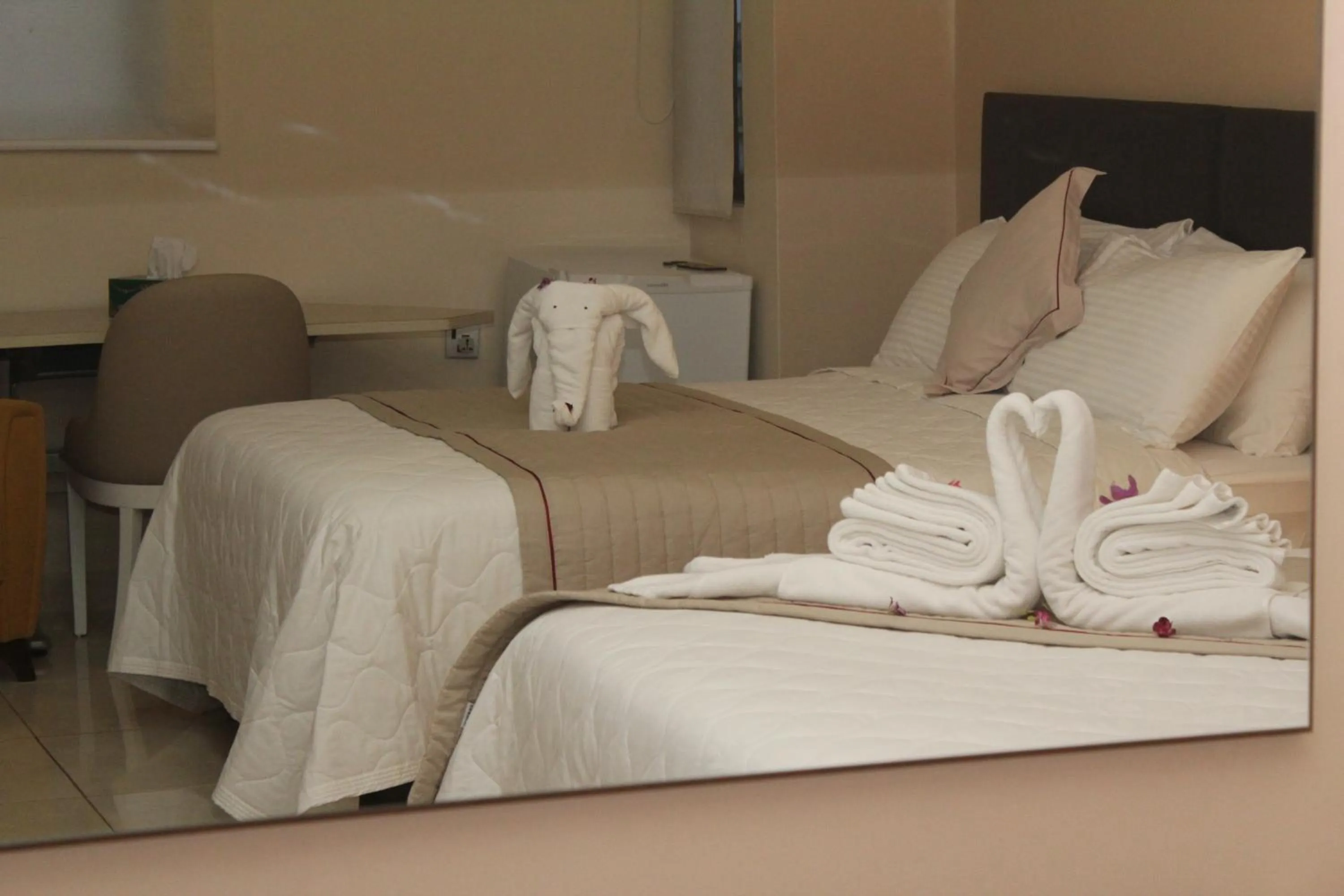 Bed in Murex Plaza Hotel & Suites