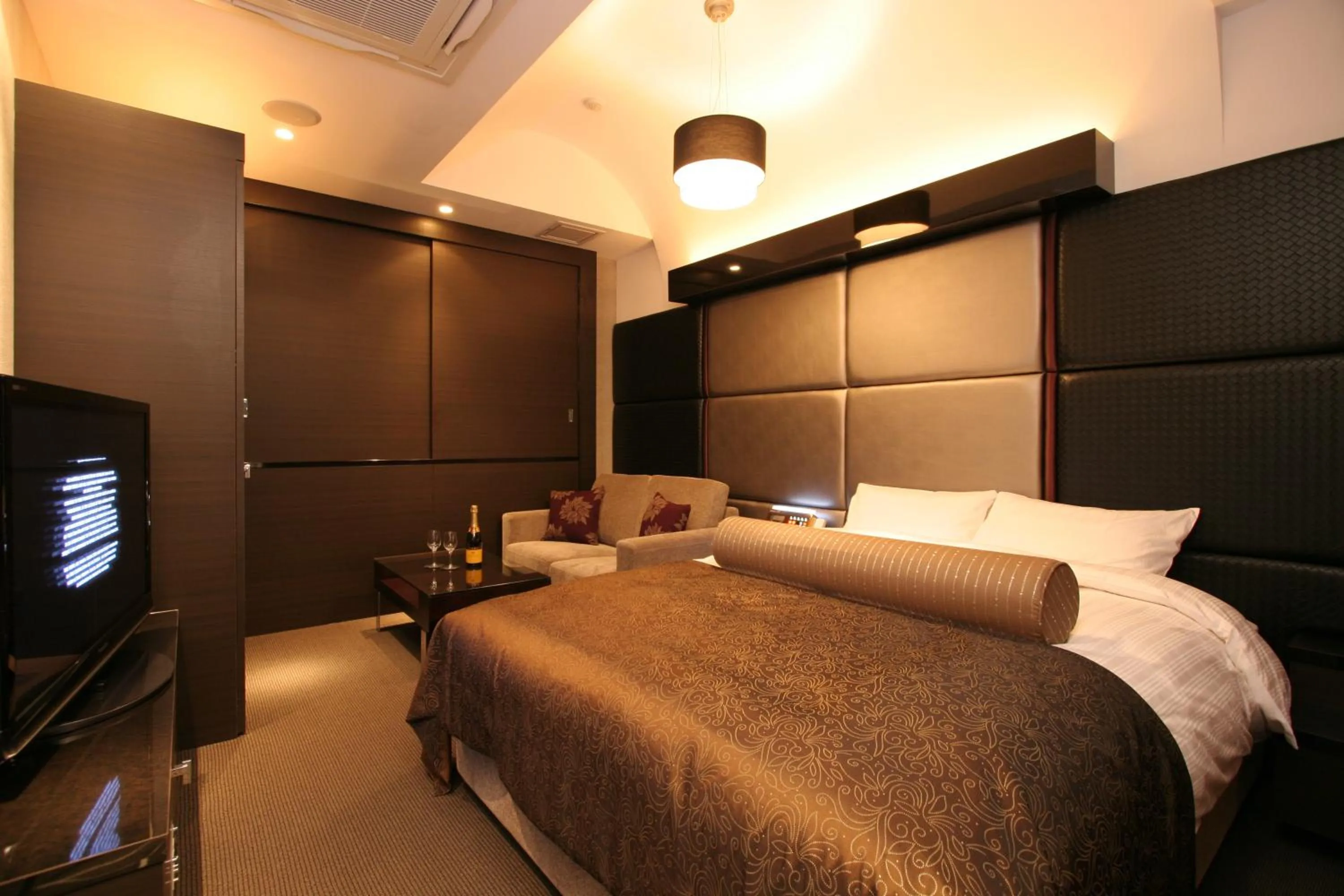 Bed in HOTEL W-PREMIUM -W GROUP HOTELS and RESORTS-