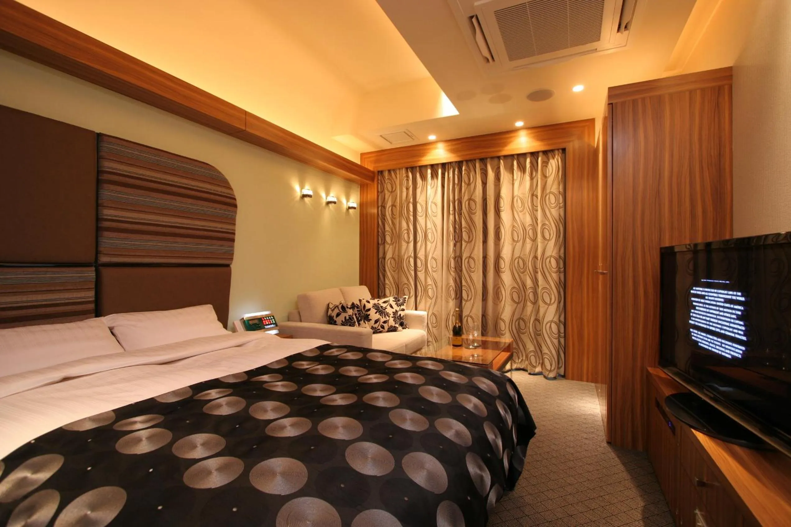 Bed in HOTEL W-PREMIUM -W GROUP HOTELS and RESORTS-